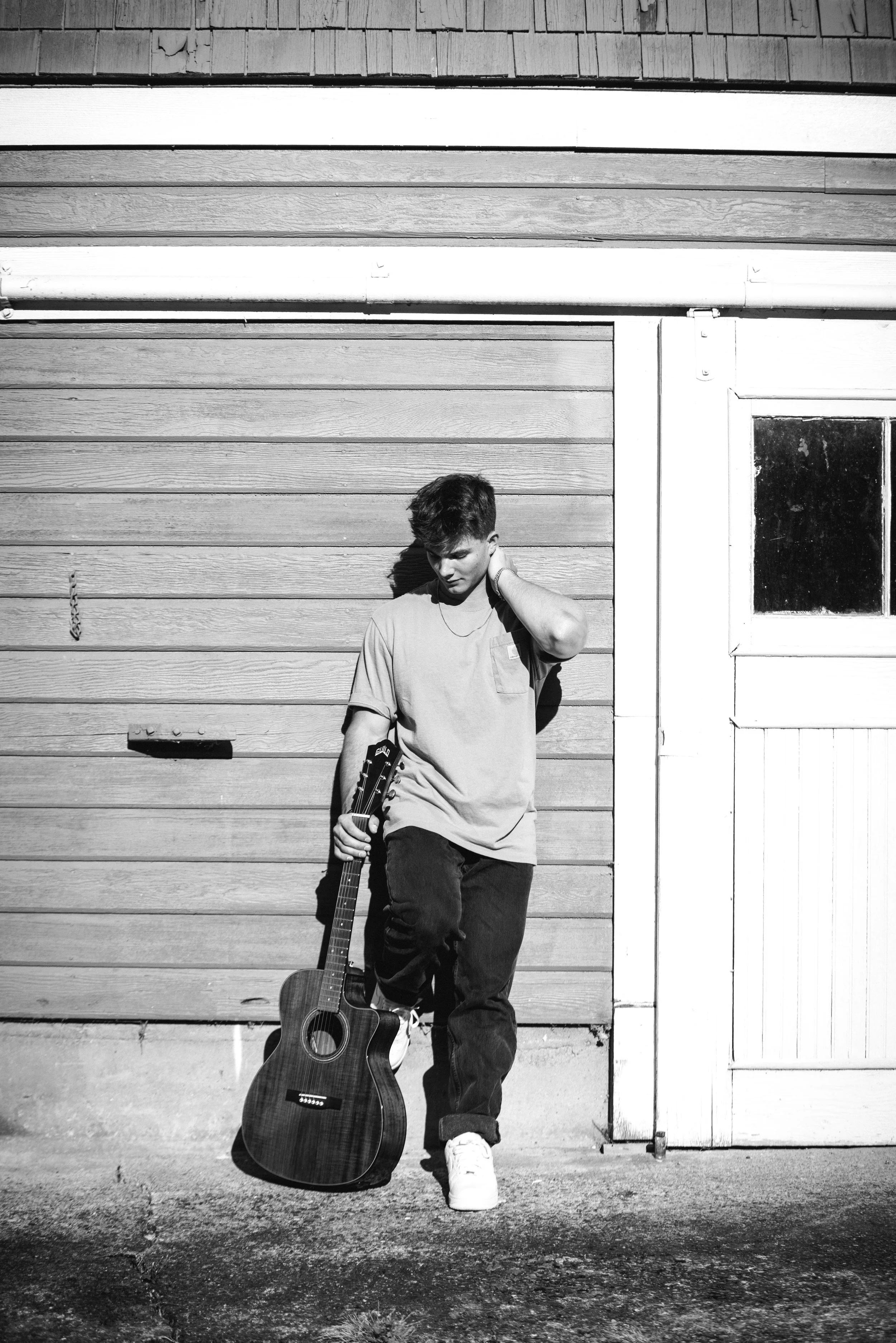 Senior portrait with guitar at Woodstock Farm, Whatcom county, Wa