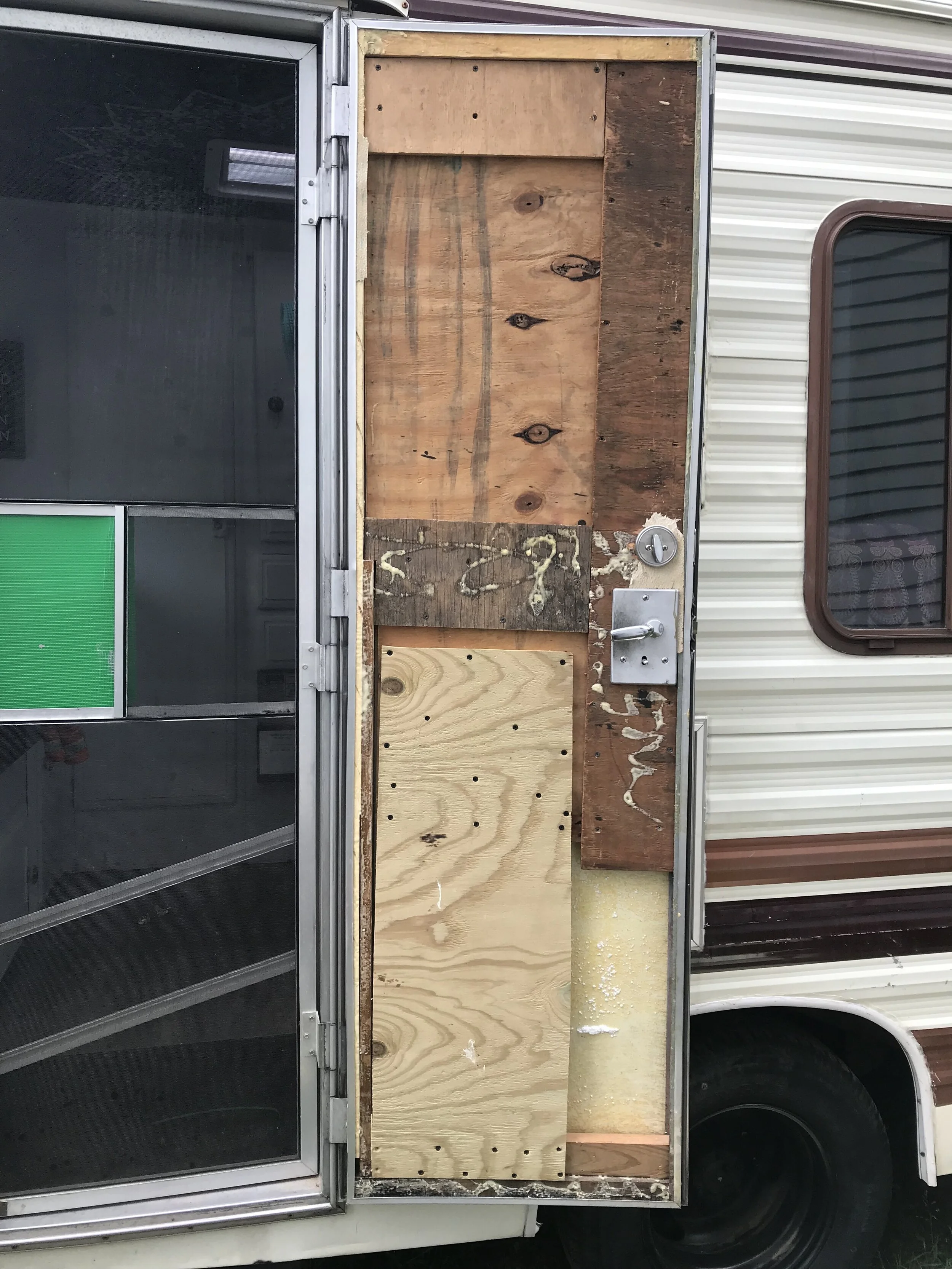 The inside of our door was made of styrofoam and was cracked in half when we bought it. Our RV is old, but most RV doors are still made of lightweight (nondurable) materials.