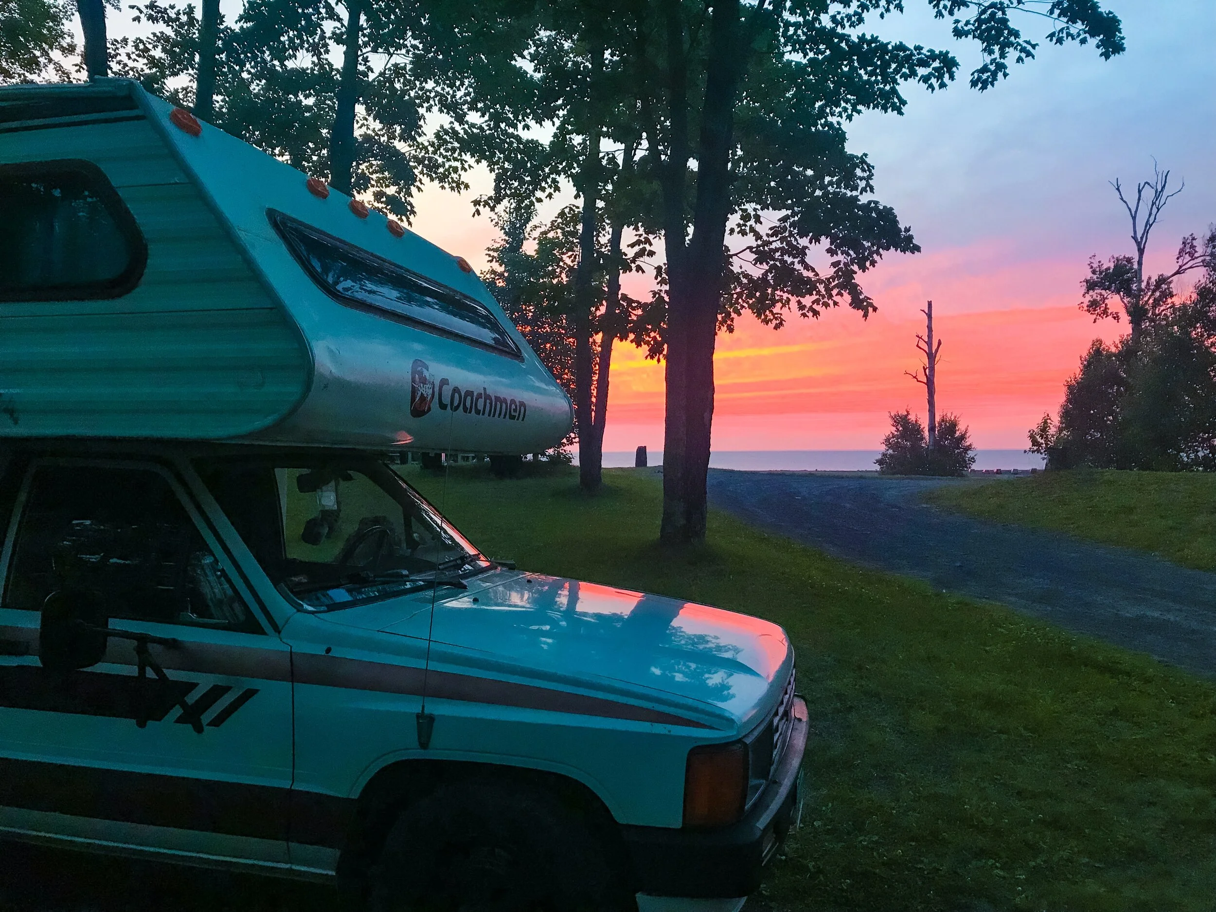 One of the coolest free campsites we’ve ever stayed at! That purple band at the bottom of the sunset is Lake Superior!