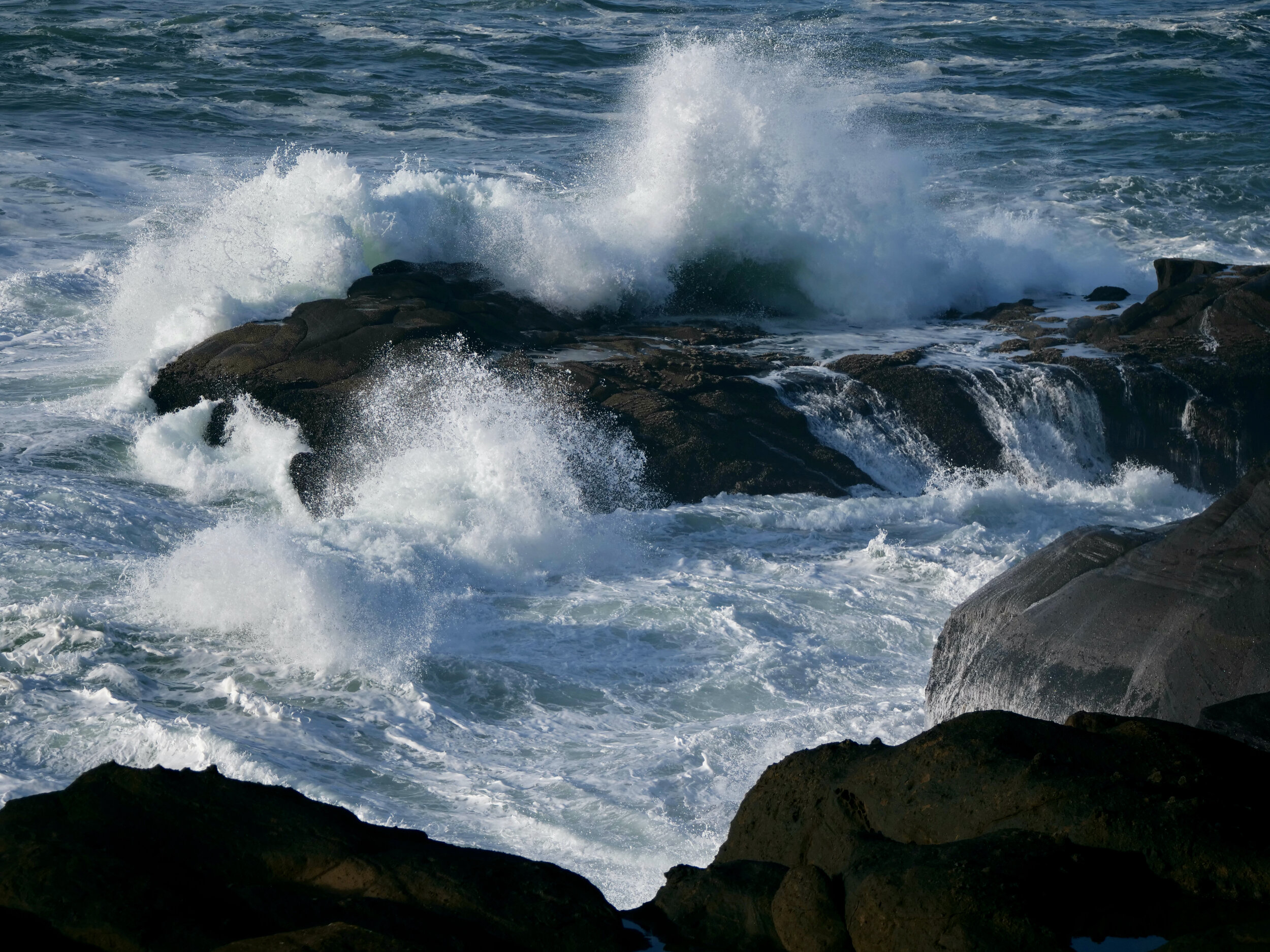 Crashing wave on rock, Depot Bay Oregon