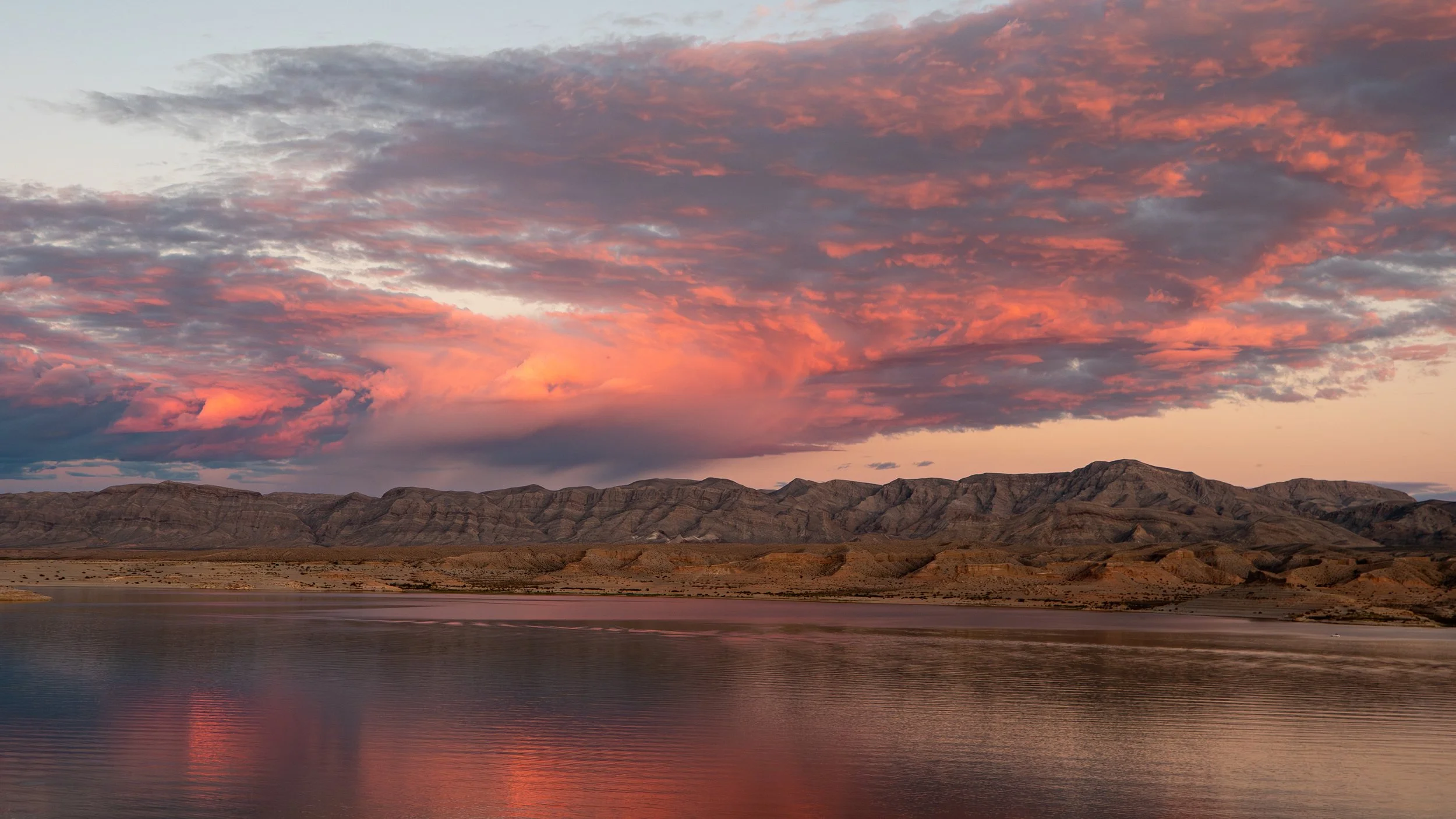 Sunset Storm Clouds Reflecting on Lake Mead, Nevada Desert Landscape