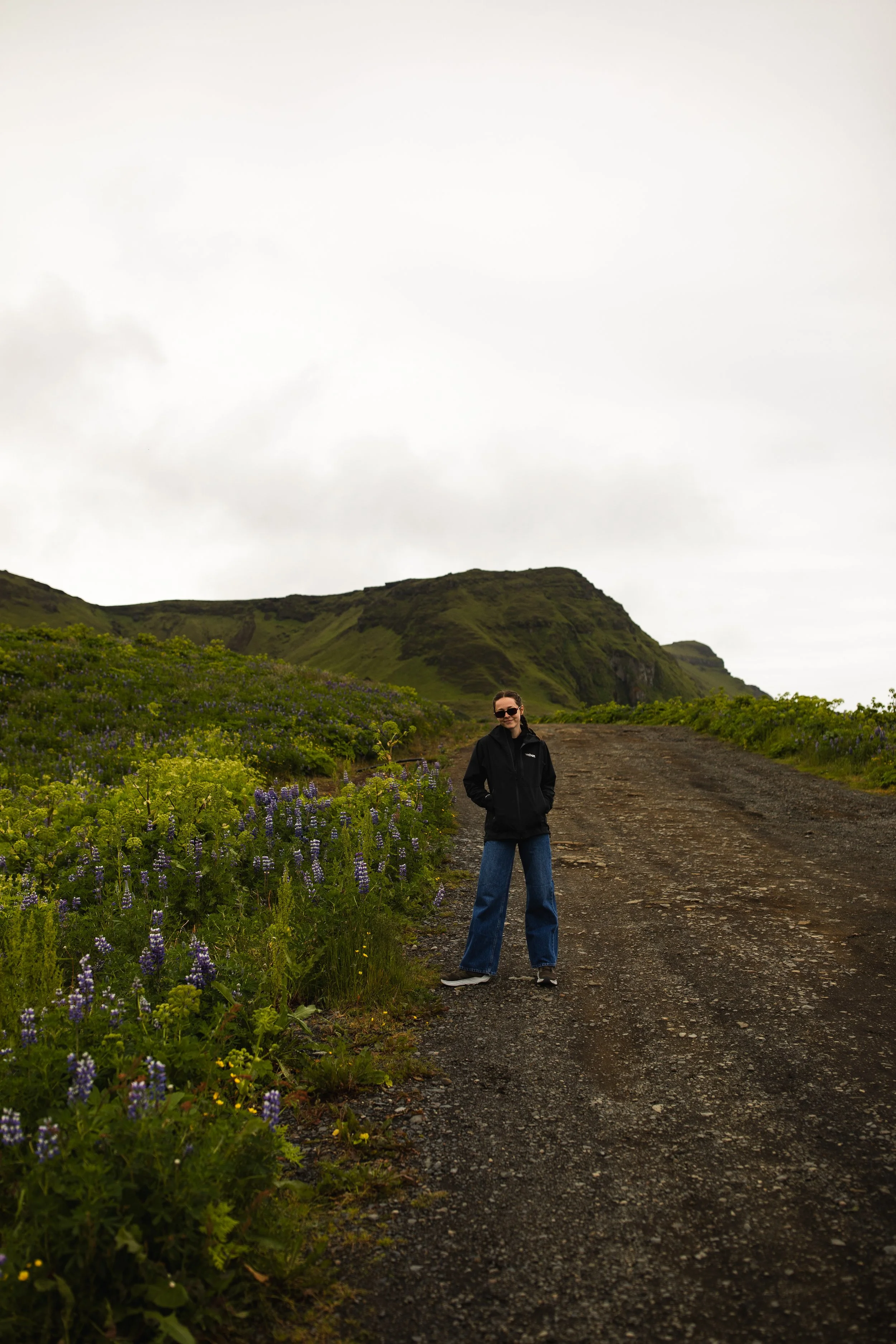 Portrait of a travel photographer on the hills in Vic, Iceland