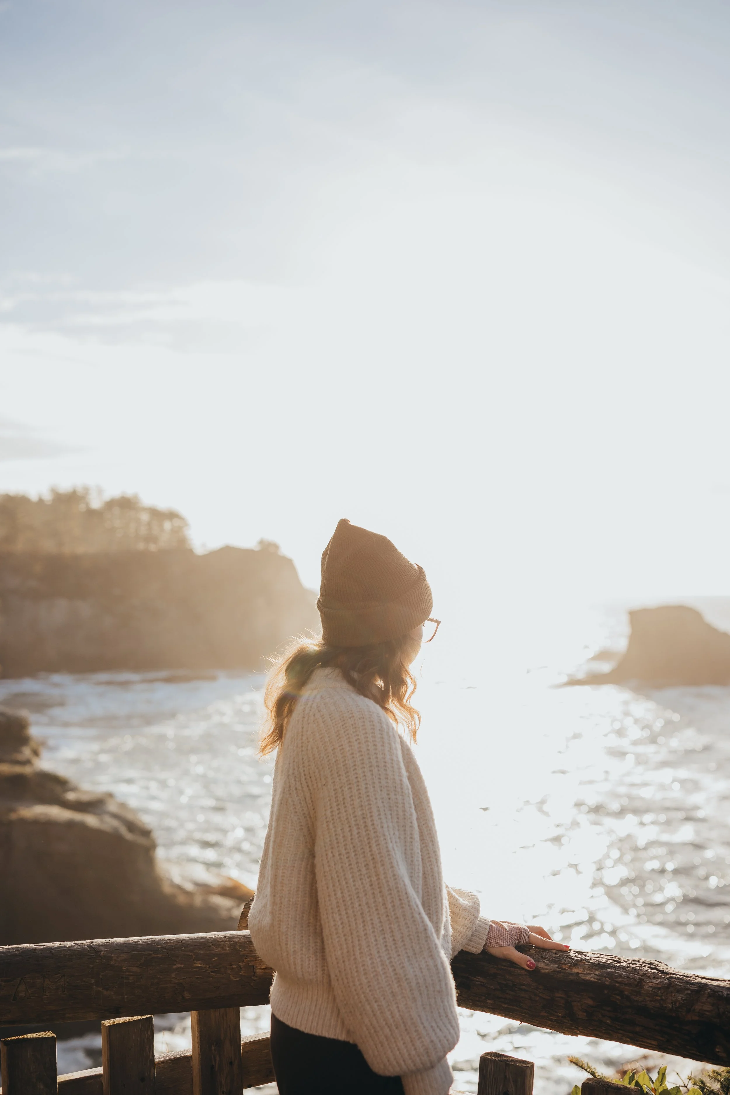 Portrait of woman looking out at the water in Cape Flattery