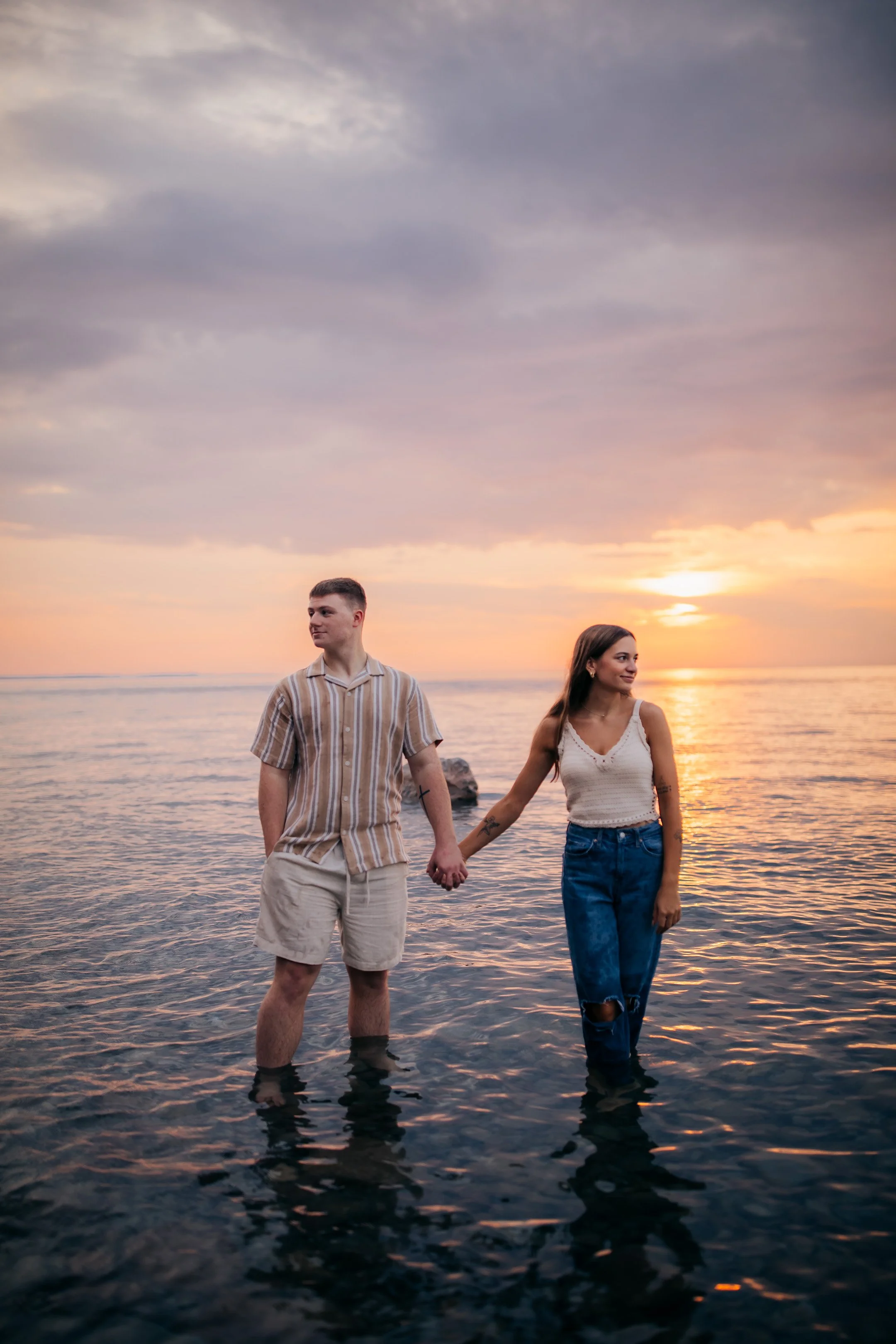 Couples photoshoot during sunset at Chimney Bluffs State Park in Wolcott, NY