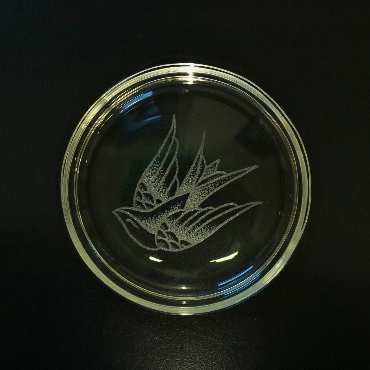 American Traditional style swaloe image engraved on glass plate by Harry King
