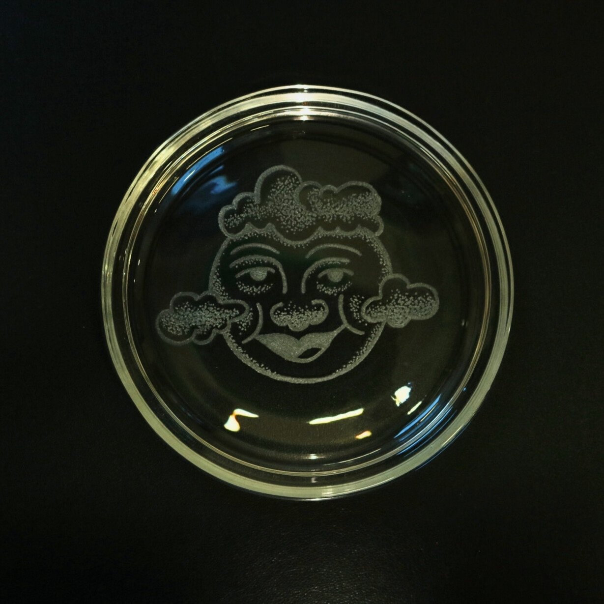 moon and clouds graphic cusomt engraved on glass dish by Harry King