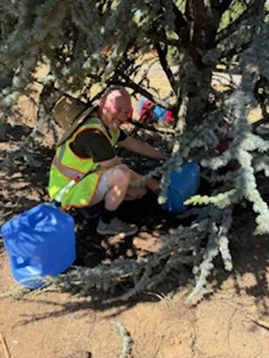 Jim Watering Newly Planted Tree_IG Aug 2025.jpeg