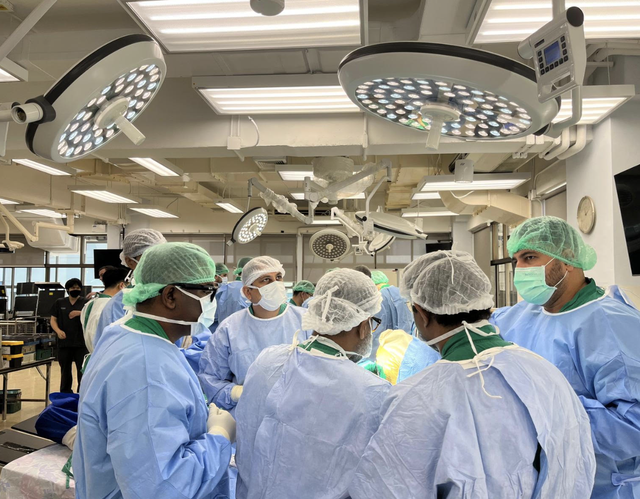 Group Photo of surgeons working together in scrubs