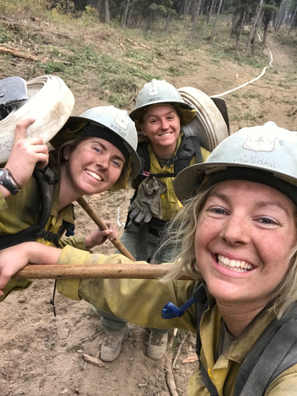 b women in fire short squad hose lay.jpeg