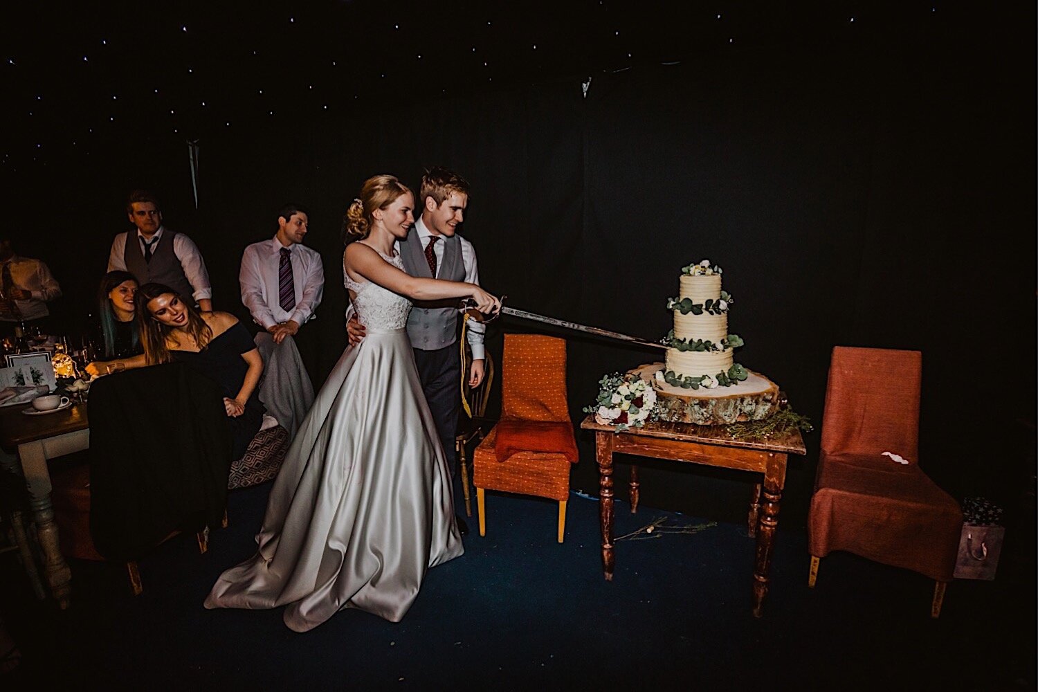 092_TWS-1097_henley_winter_bride_cake_cut_billet_photography_millitary_oxfordshire_crooked_groom_wedding.jpg