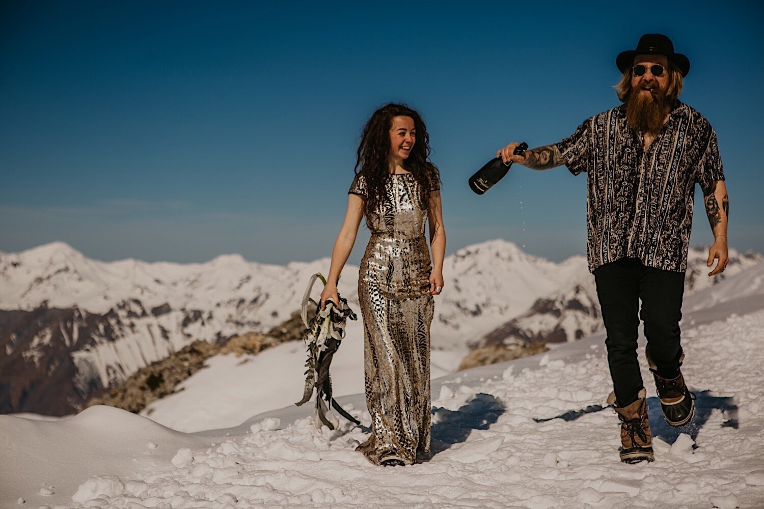 07_9D3A2911_mountain_bride_top_champagne_badass_meribel_photography_elopement_alps_snow_cigar_elope_wedding_destination_groom_photographer_winter.jpg