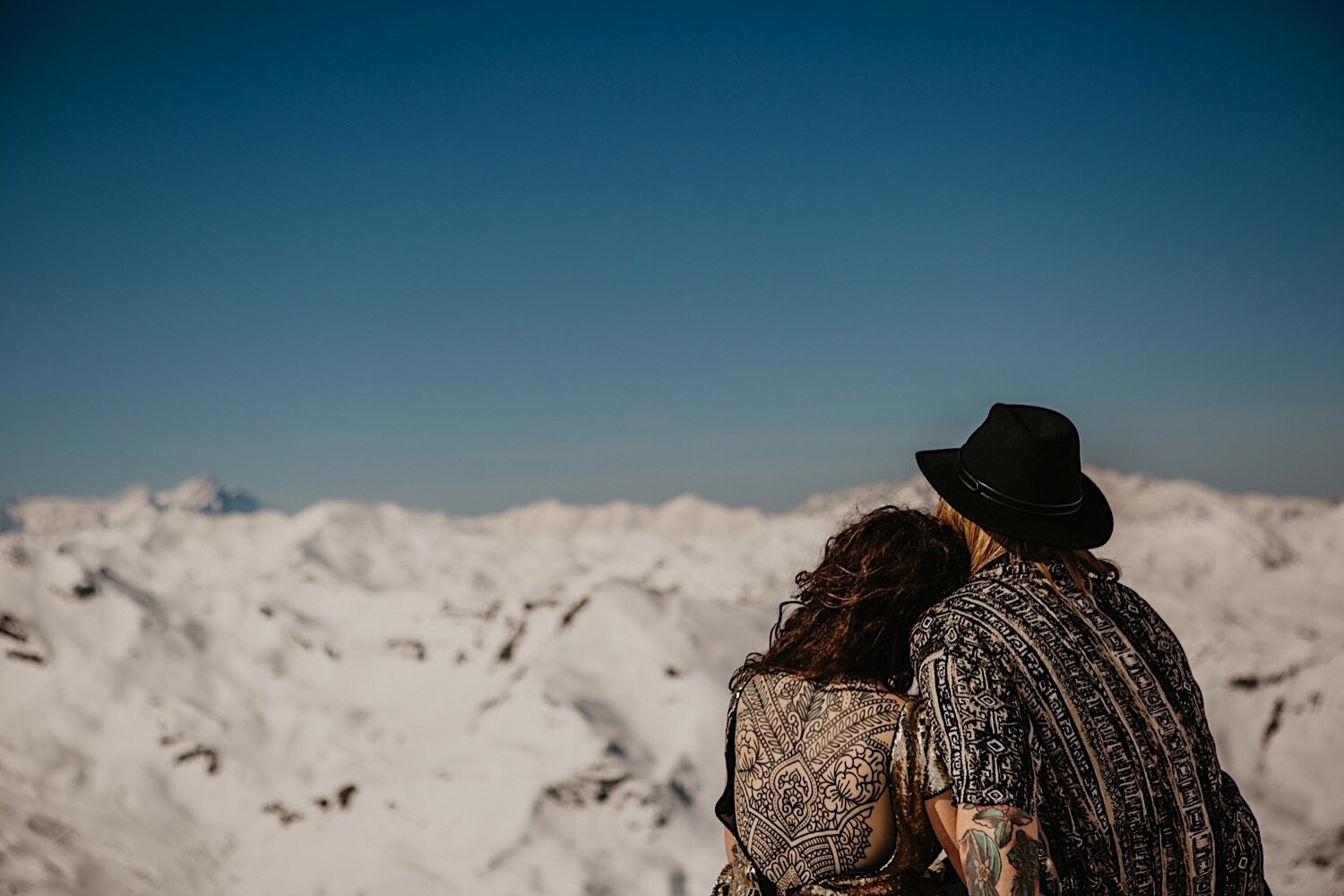 20_9D3A2955_winter_bride_top_meribel_badass_photography_elopement_alps_snow_tattoos_elope_wedding_destination_groom_photographer_mountain.jpg