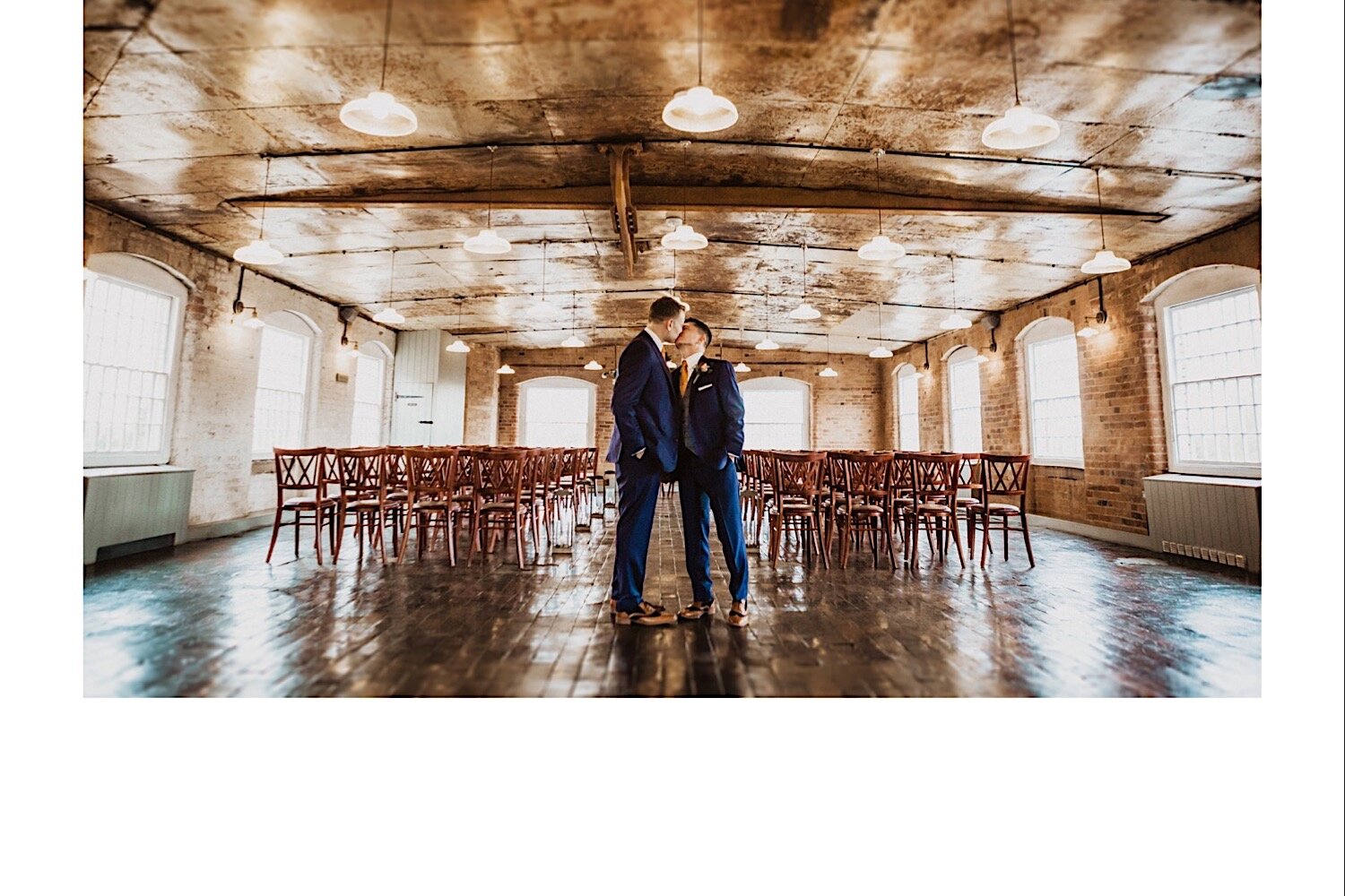 31_TWS-174_photographer_wedding_industrial_venue_grooms_gay_photography_chic_westmill_kiss_derby.jpg