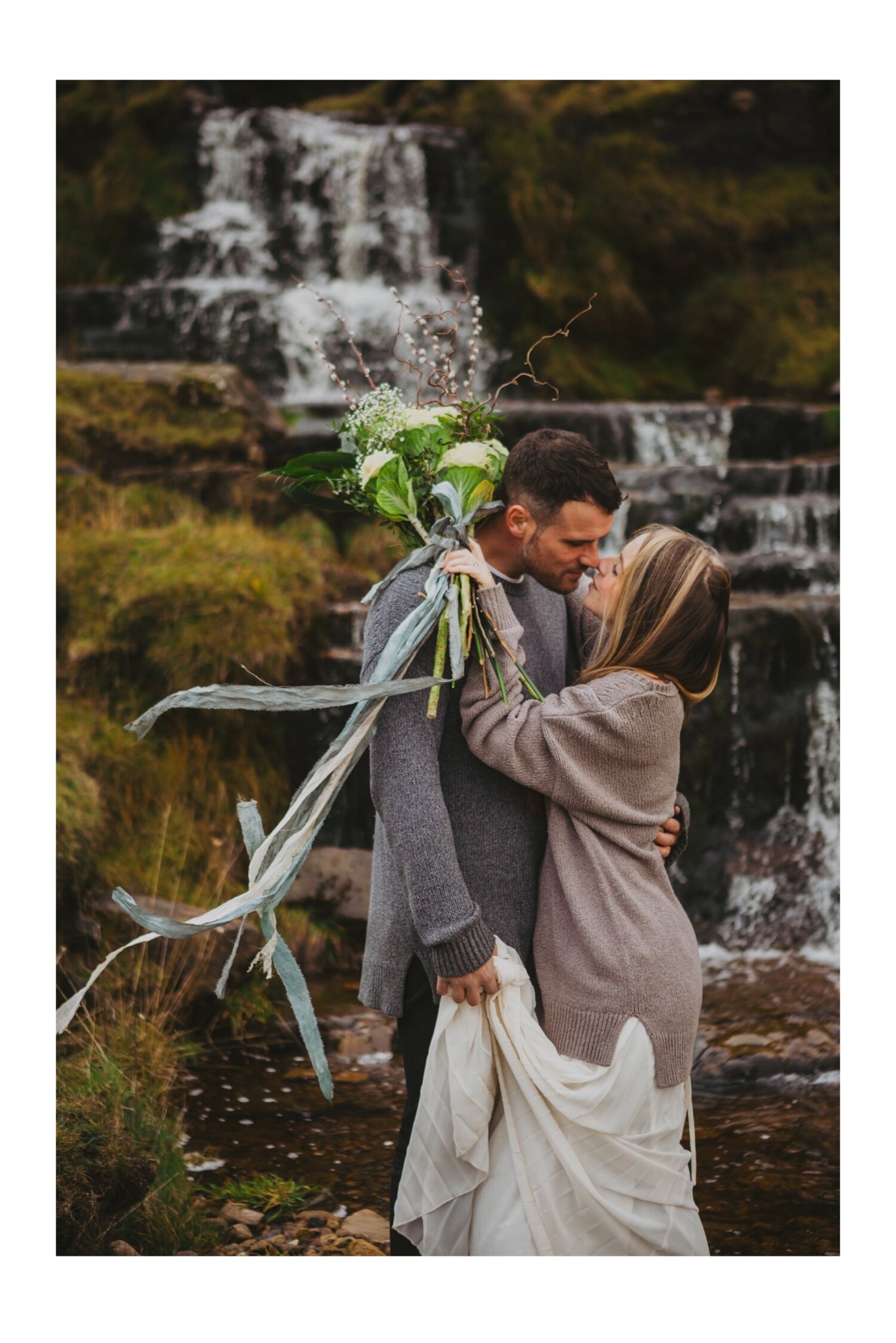 05_TWS-100__grey_dramatic_landscape_alternative_elope_alt_rock_blue_waterfall_winter_flowers_offbeat_dales_waterfalls_autumn_elopement_photography_ribbons_moody_bride_silver_wedding_yorkshire_rainy_cloudy_cosy_weather_photographer_florals_groom.jpg
