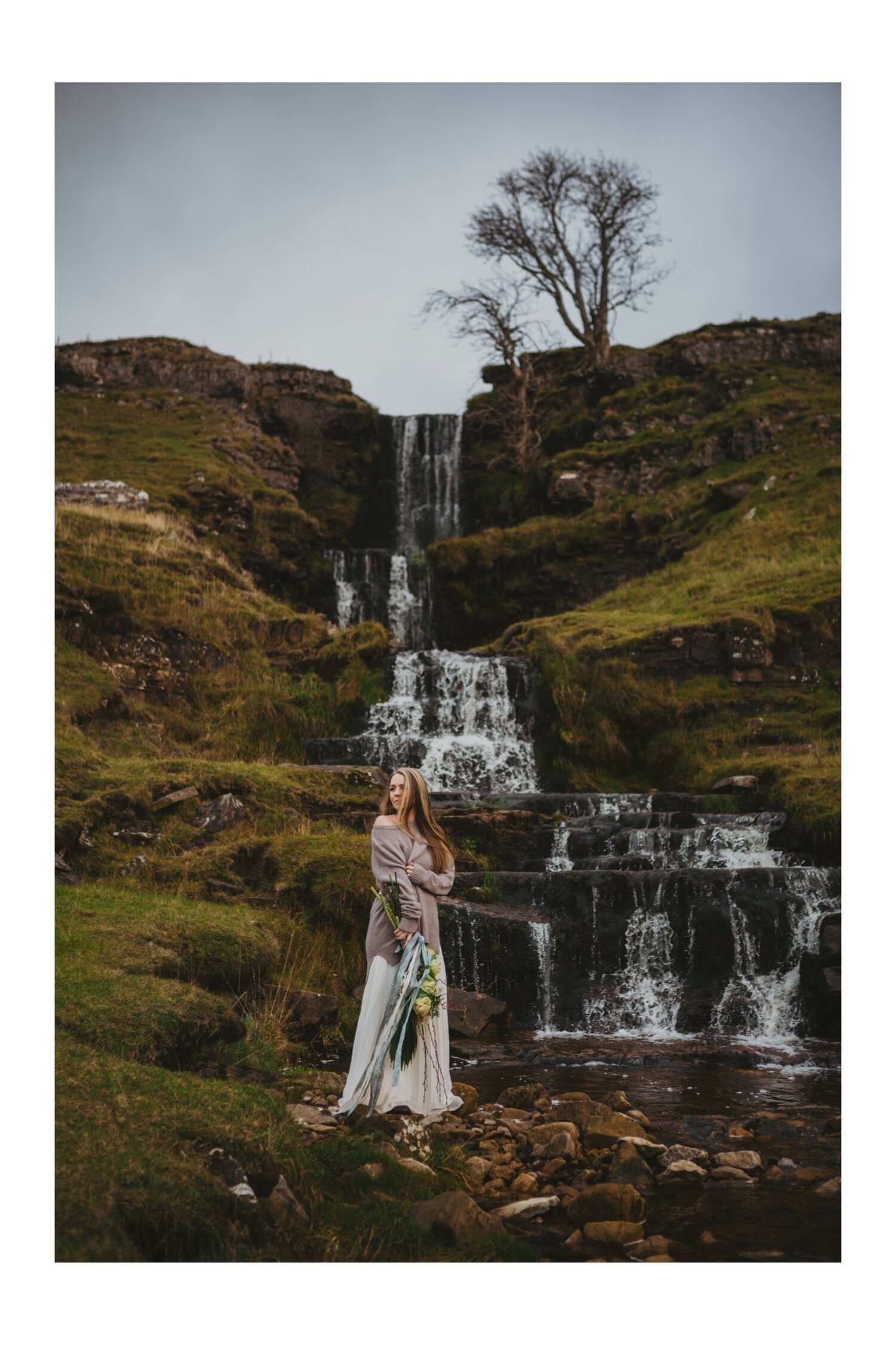 23_TWS-66__grey_dramatic_landscape_alternative_elope_alt_rock_blue_waterfall_winter_flowers_offbeat_dales_waterfalls_autumn_elopement_photography_ribbons_moody_bride_silver_wedding_yorkshire_rainy_cloudy_cosy_weather_photographer_florals_groom.jpg