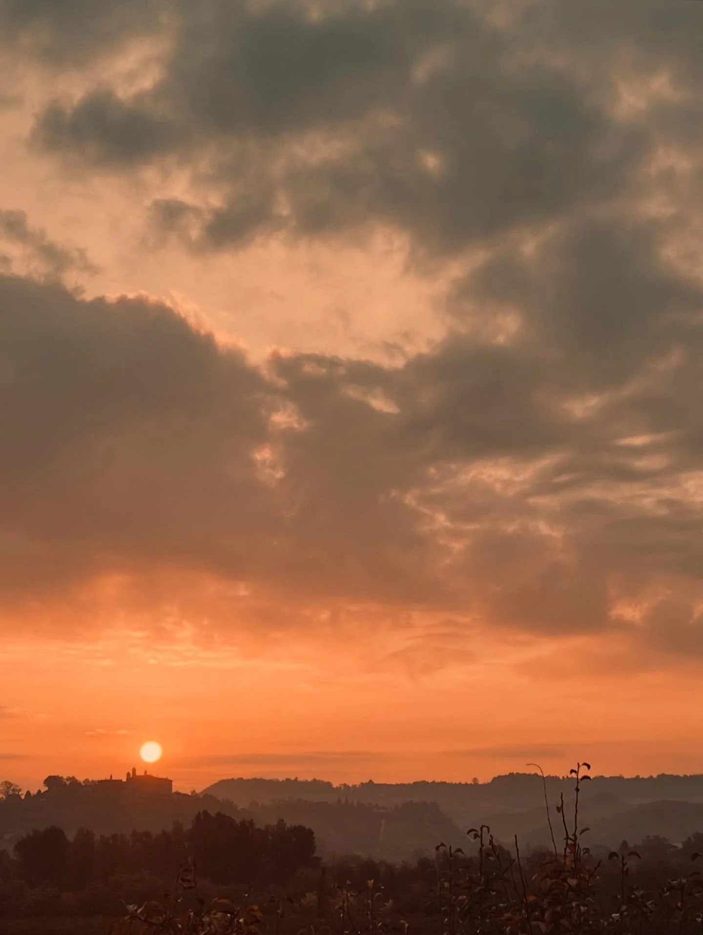 It's been a few years since we were in Italy in November.  I had forgotten how much I love the light this time of year, with haze settling between the mountain layers in  different shades a of grey and purple against the peach and soft blush sky. A w
