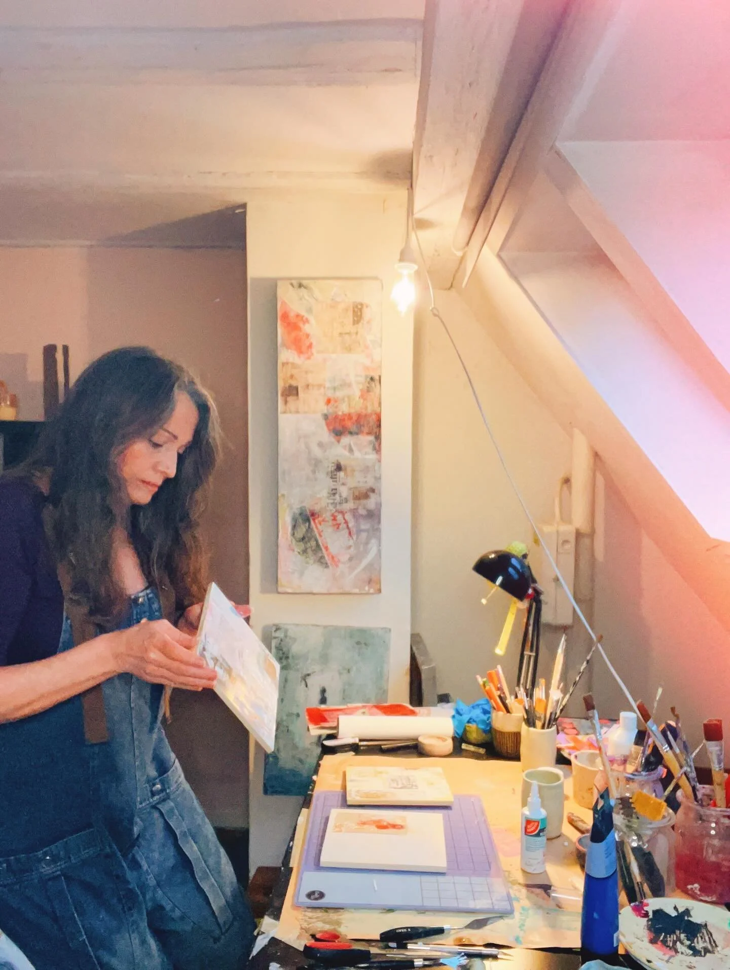 In my upstairs studio space I laid down layers for small mixed media pieces.  The rain gently pattered on the slanted window and I lost track of time, just cutting and pasting and plastering a bit.  These will dry and I'll see what the next steps wil