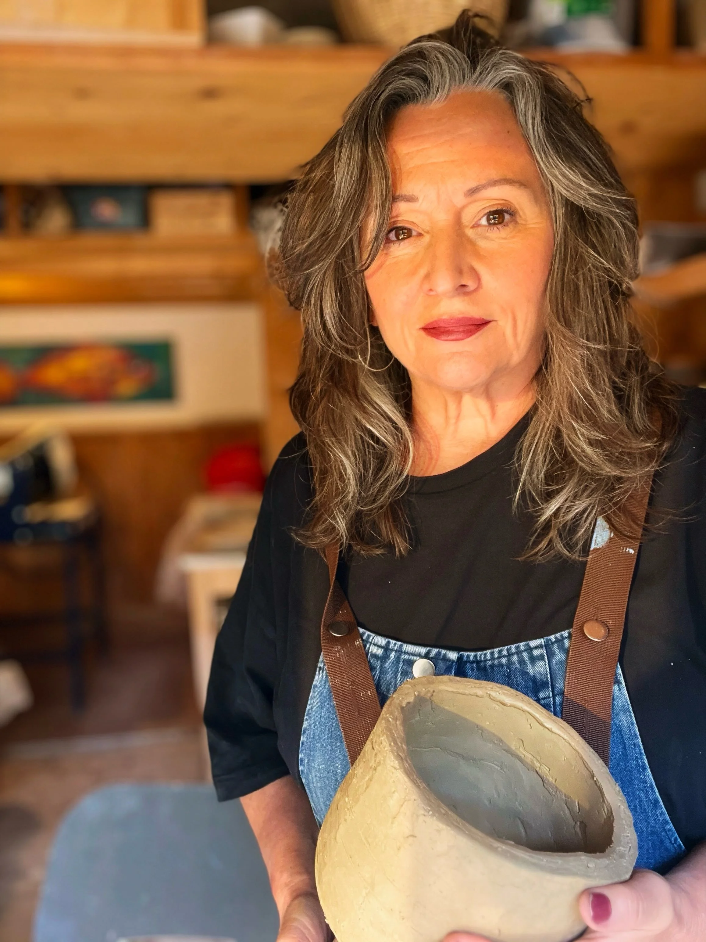 GOOD FOR THE SOUL

At times I need to return to anthropological pottery forms, the kind made by ancient women and men by rolling pieces of earth and sticking it together and burning it in a fire - learning that somehow this created a vessel that coul