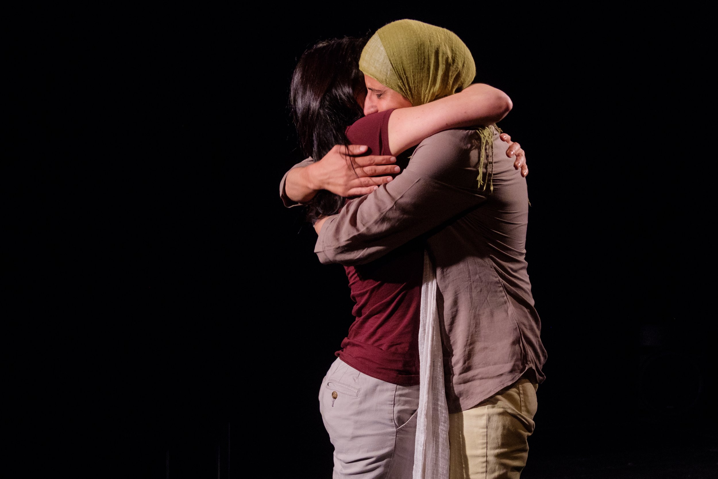 Einat and Dareen hugging (David Kaplan, hi res).jpg