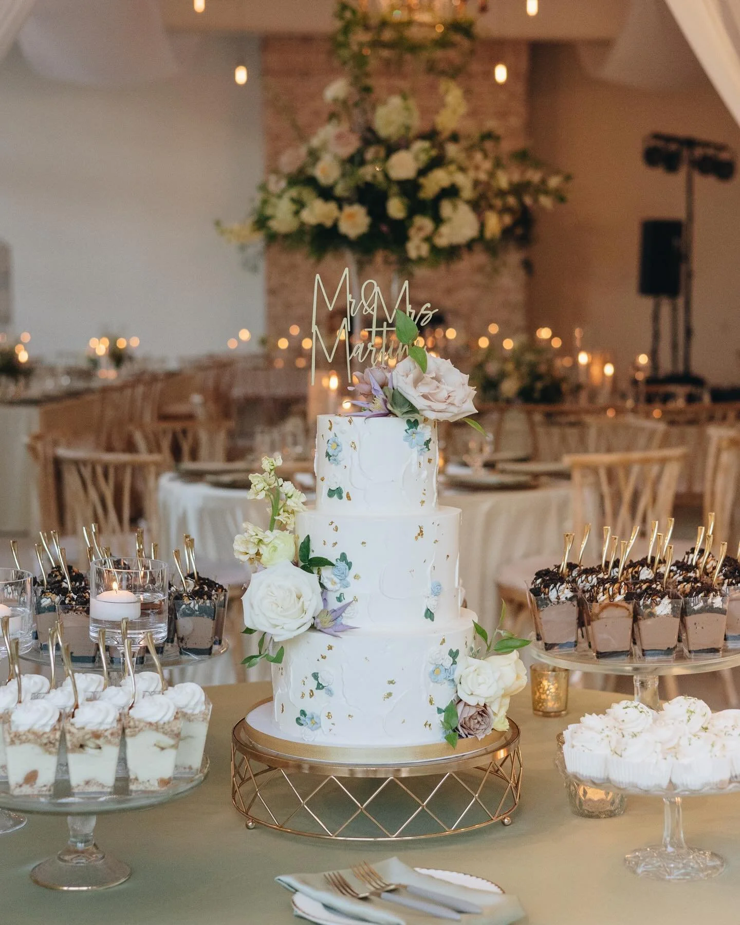 Embrace timeless elegance with a textured wedding cake adorned with beautiful floral accents!  Elevate your special day with a custom wedding cake as your centerpiece.  We strive to ensure that our cakes not only look good but also taste devine! 

📸