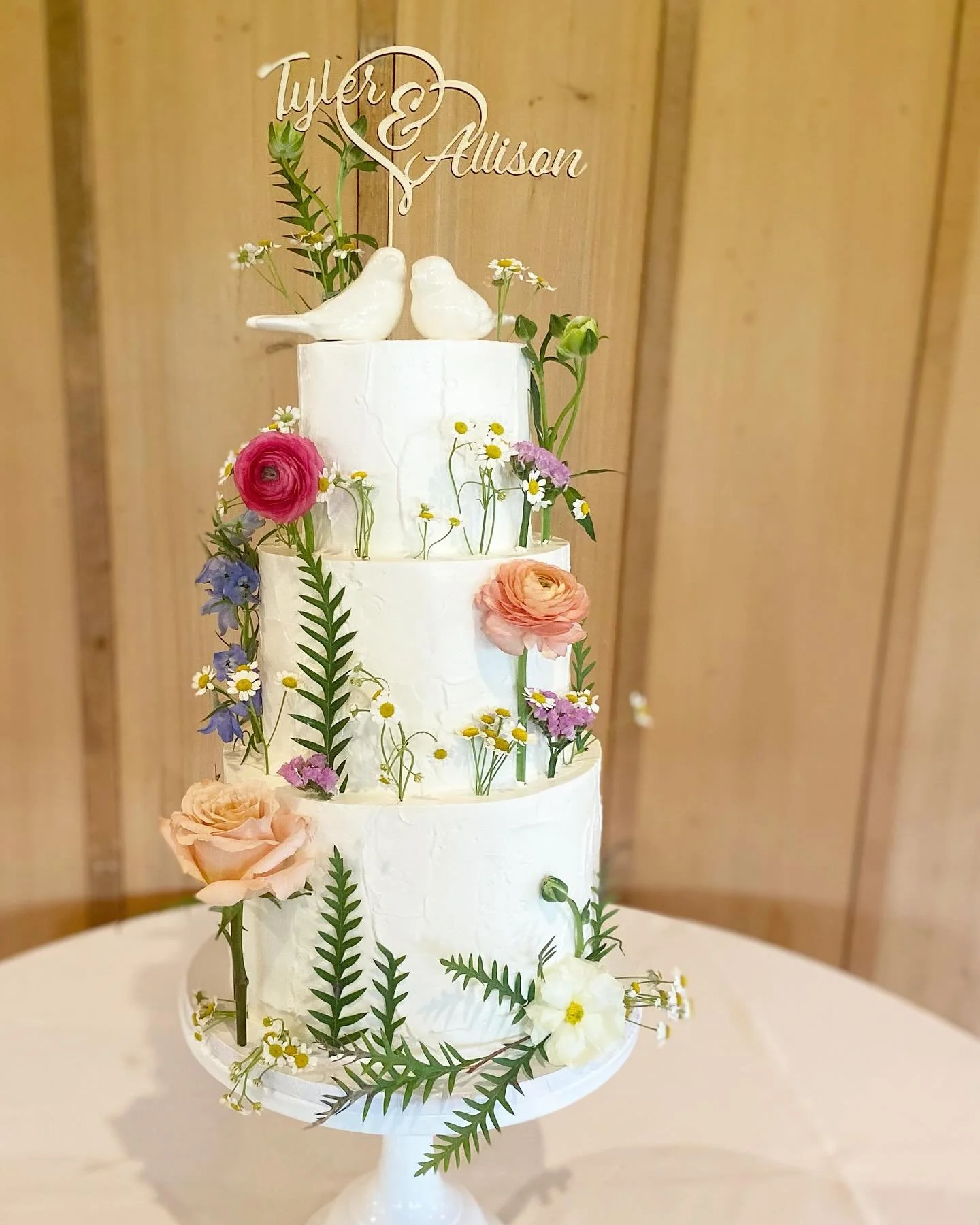 Wildflower inspired cake for our nature loving couple this past weekend. 🌸🌿🌼

Soft stucco textured buttercream technique with fresh florals is a favorite combination of ours!

@thechapelatduplin
.
.
.
.
.
#wildflowers #wildflowercake #wilmingtonwe