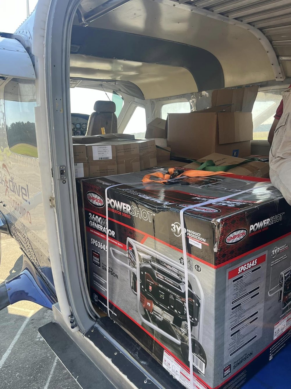 Generators loaded on a plane.jpg