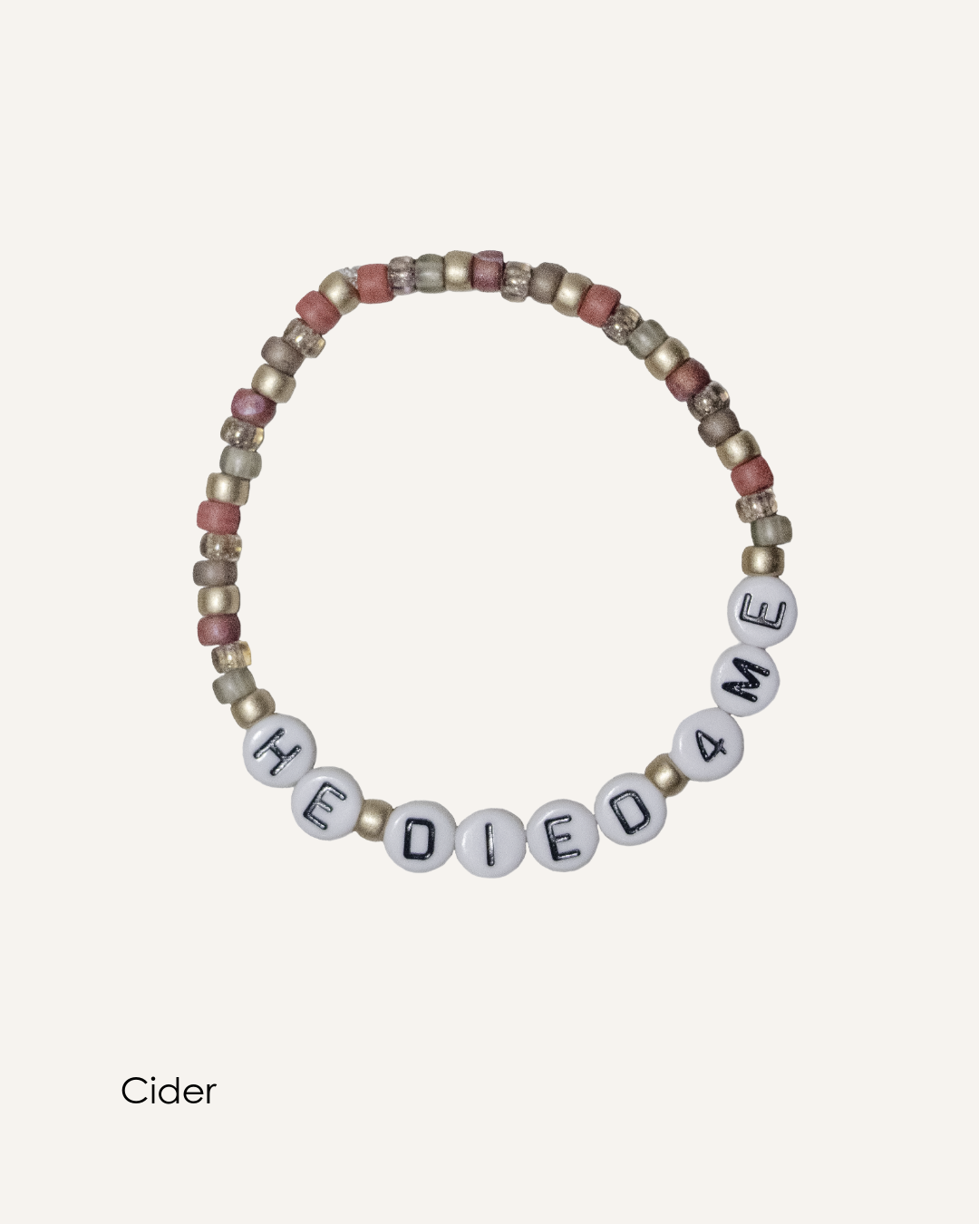 HE DIED 4ME handmade seed bead bracelet in Cider colorway with warm earthy rocaille beads and white alphabet beads on elastic band.