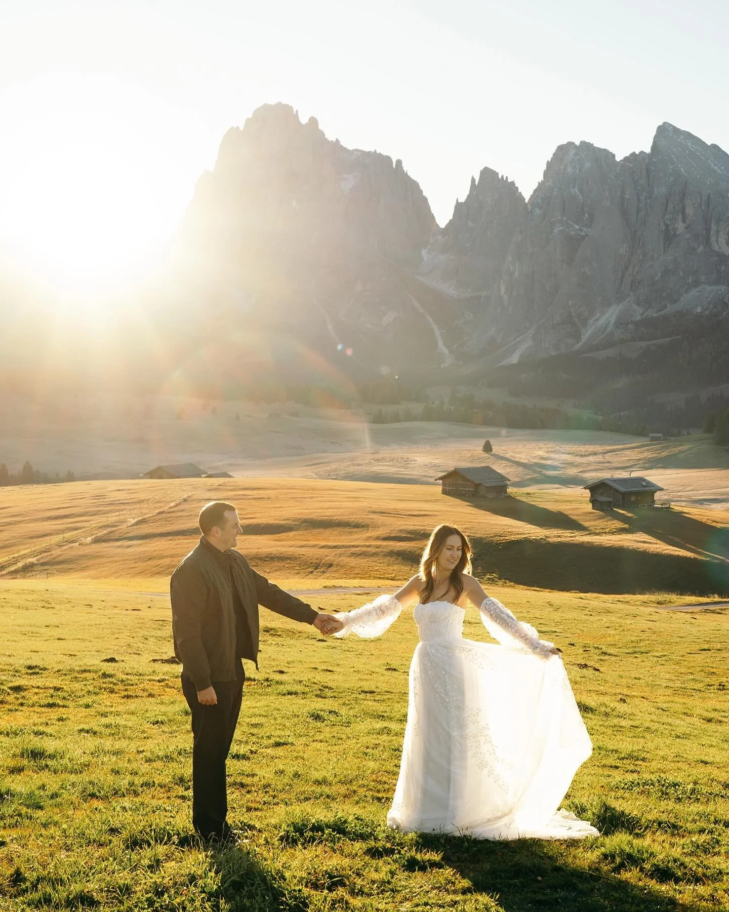 When Sara reached out, she had a vision; she wanted a meadow with mountains in the background so she could have photos with her dogs, but she also wanted to wear a stunning dress she bought in France. When I suggested Alpe di Suisi, it was the perfec