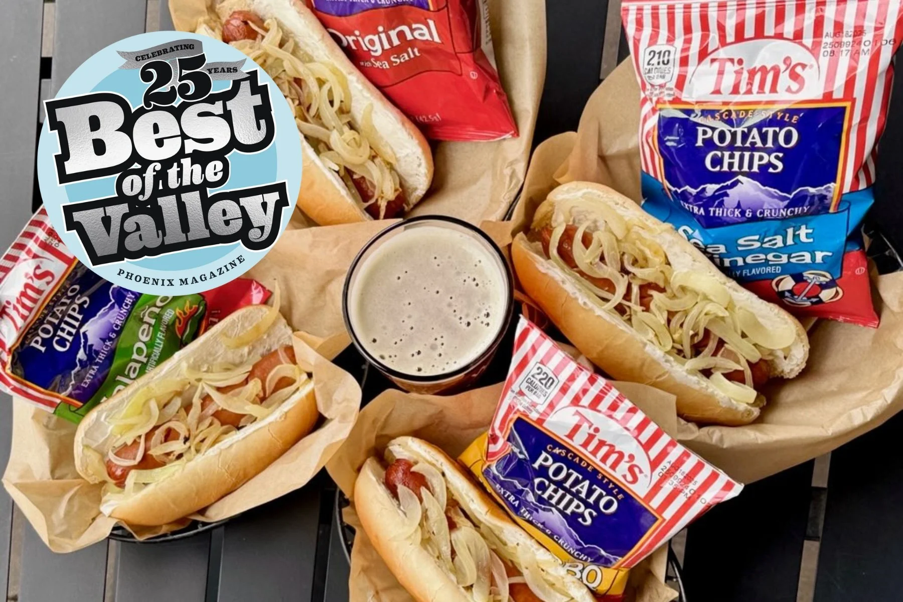 Seattle dog - a hot dog with onions, cream cheese, a beer, bags of Tim's potato chips- winner of Phoenix Magazine 2025 Readers' Choice Best of the Valley Best Hot Dog