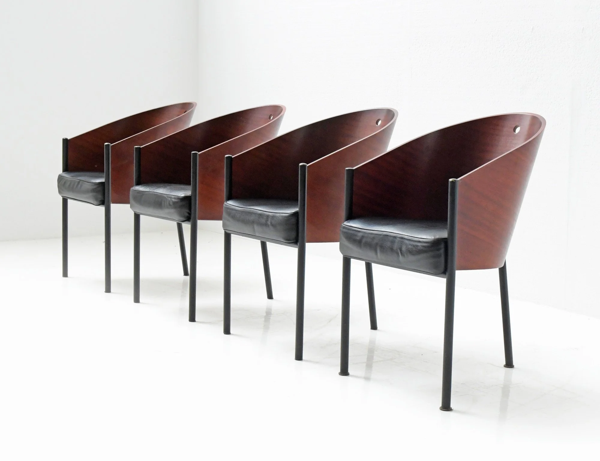 1 Costes black leather Philippe Starck Driade aleph postformed plywood mahogany.jpg