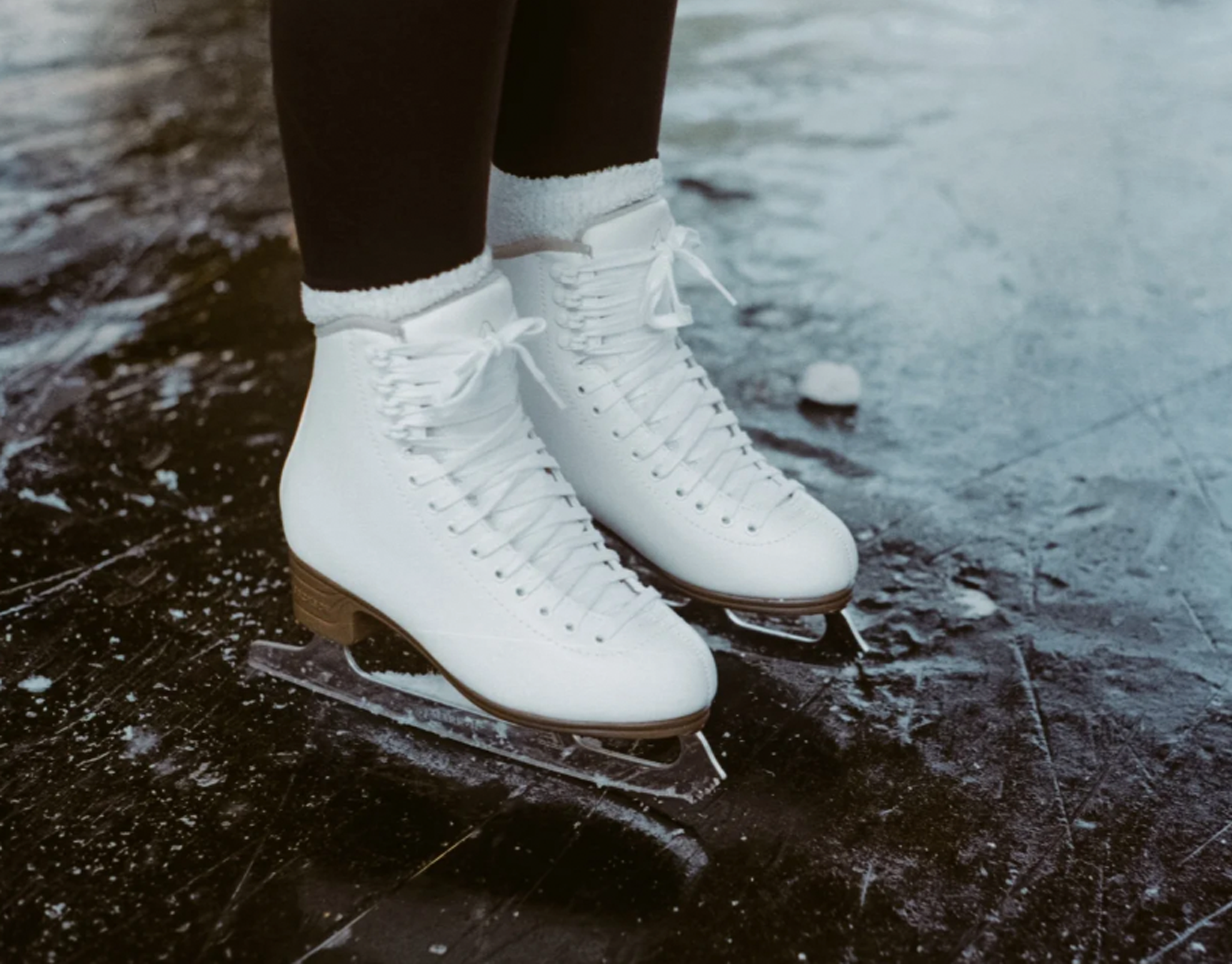 Photo of ice skates on ice