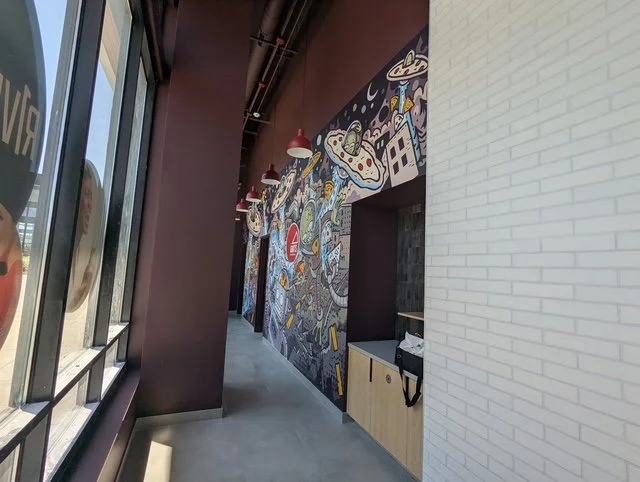 Ians Pizza interior mural hallway.jpg