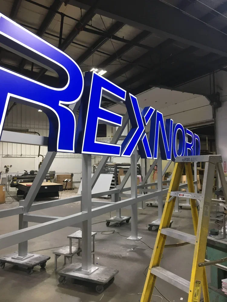 Rexnord exterior illuminted in shop.webp