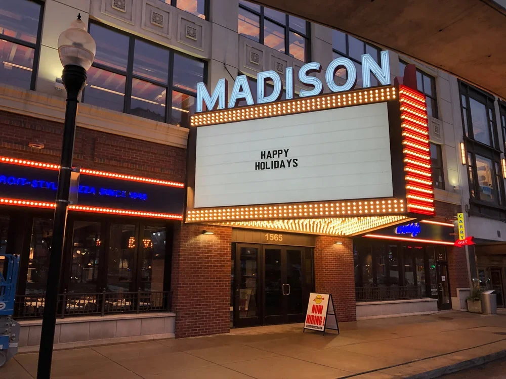 Buddys pizza and madison exterior illuminated.webp