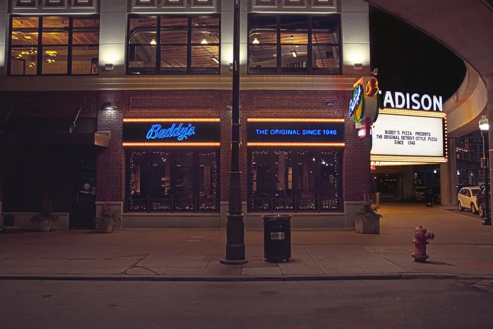 buddys exterior illuminated street view.webp