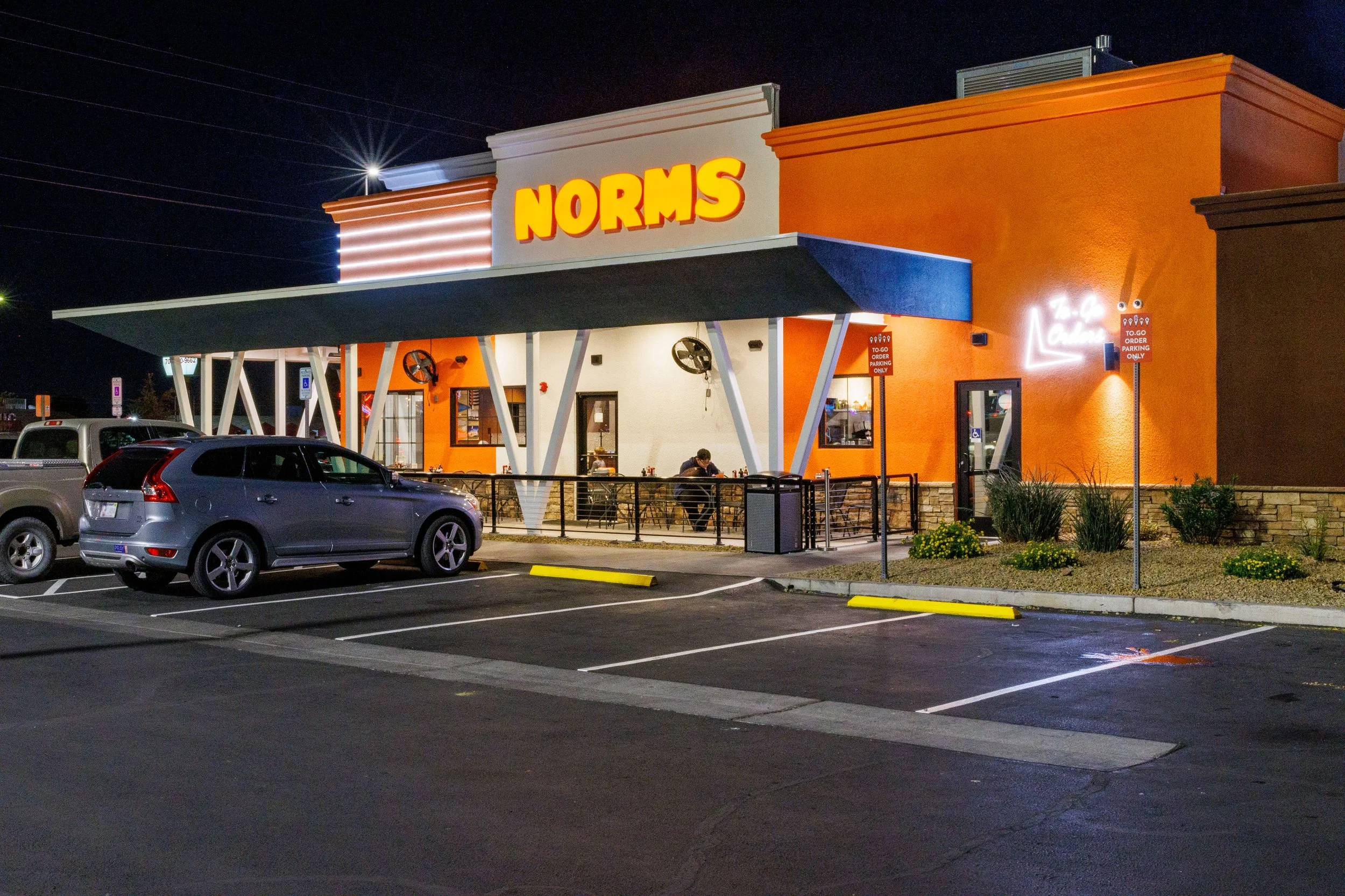 Norms entryway illuminated exterior.JPG