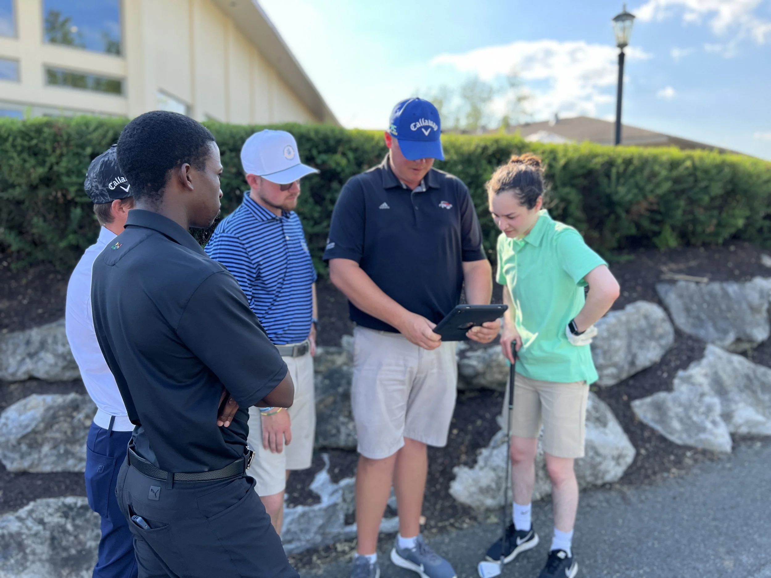 Tom Reynolds performing a swing analysis