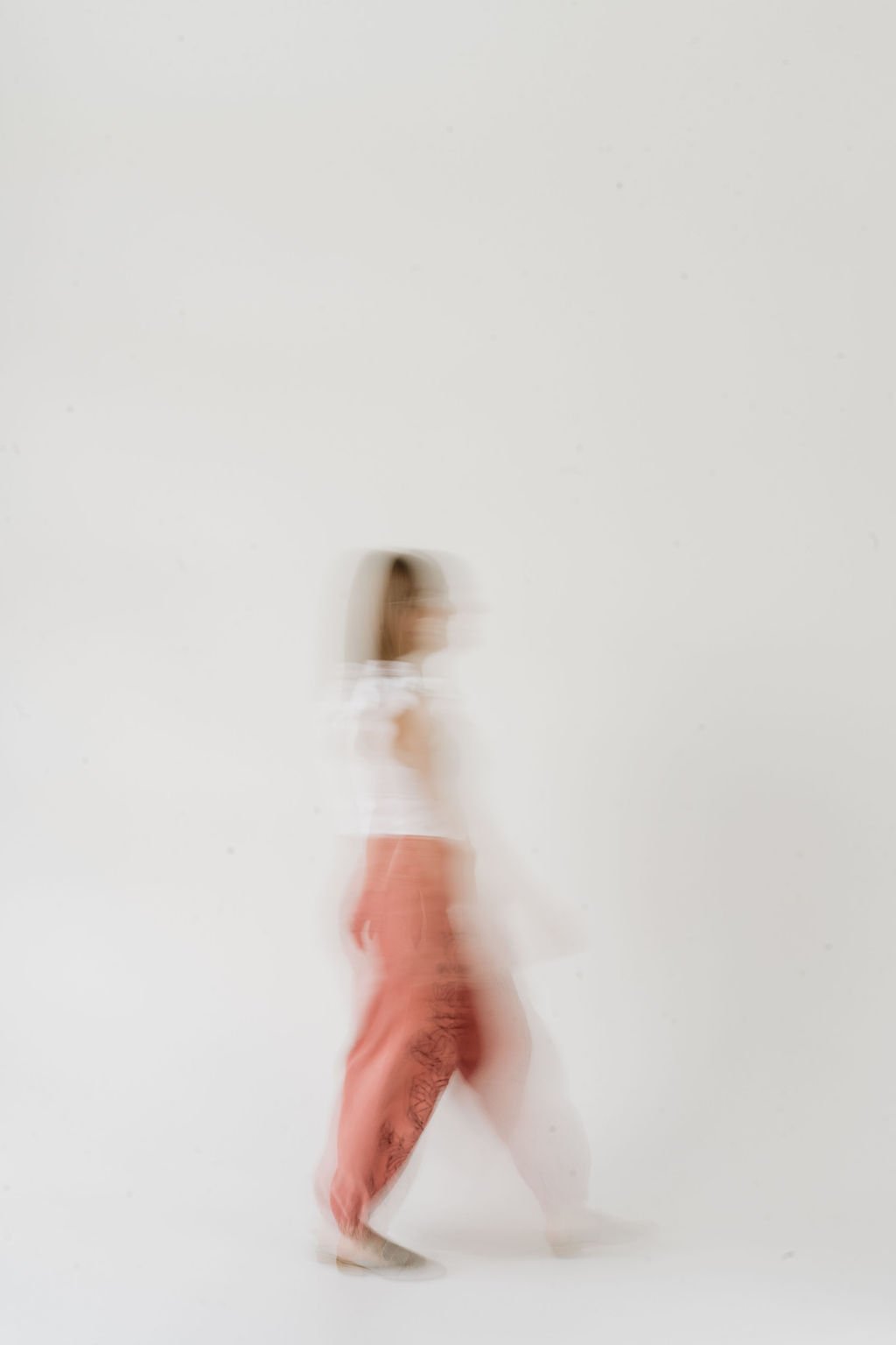 Denver holistic therapist, Leanne Morton, walking forward.