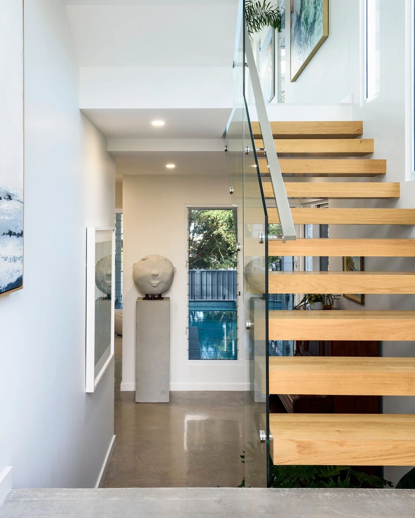 Light-filled, from the moment you walk in. ☀️

The first impression of a home isn't only the facade - it's the moment the front door opens and the light either welcomes you in, or doesn't. Getting that right takes real thought about orientation, wind