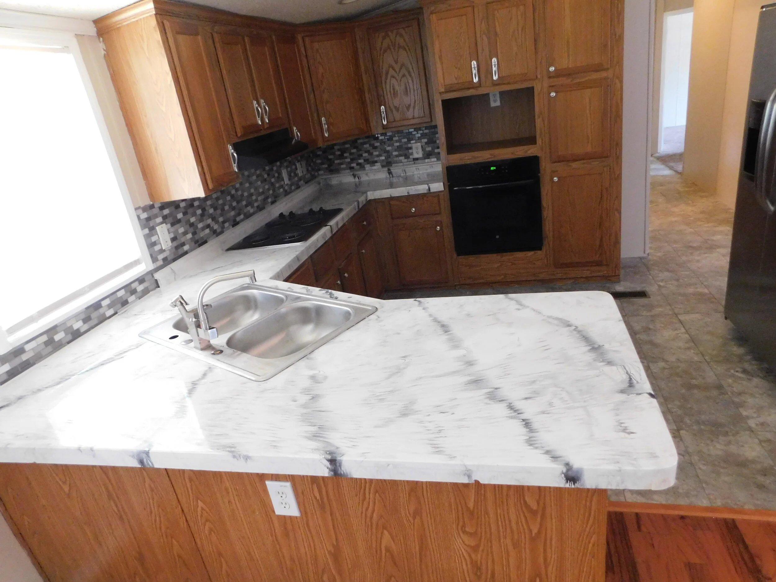 Traditional Kitchen Remodel by Unique Countertop Creations — Project 2 project photo