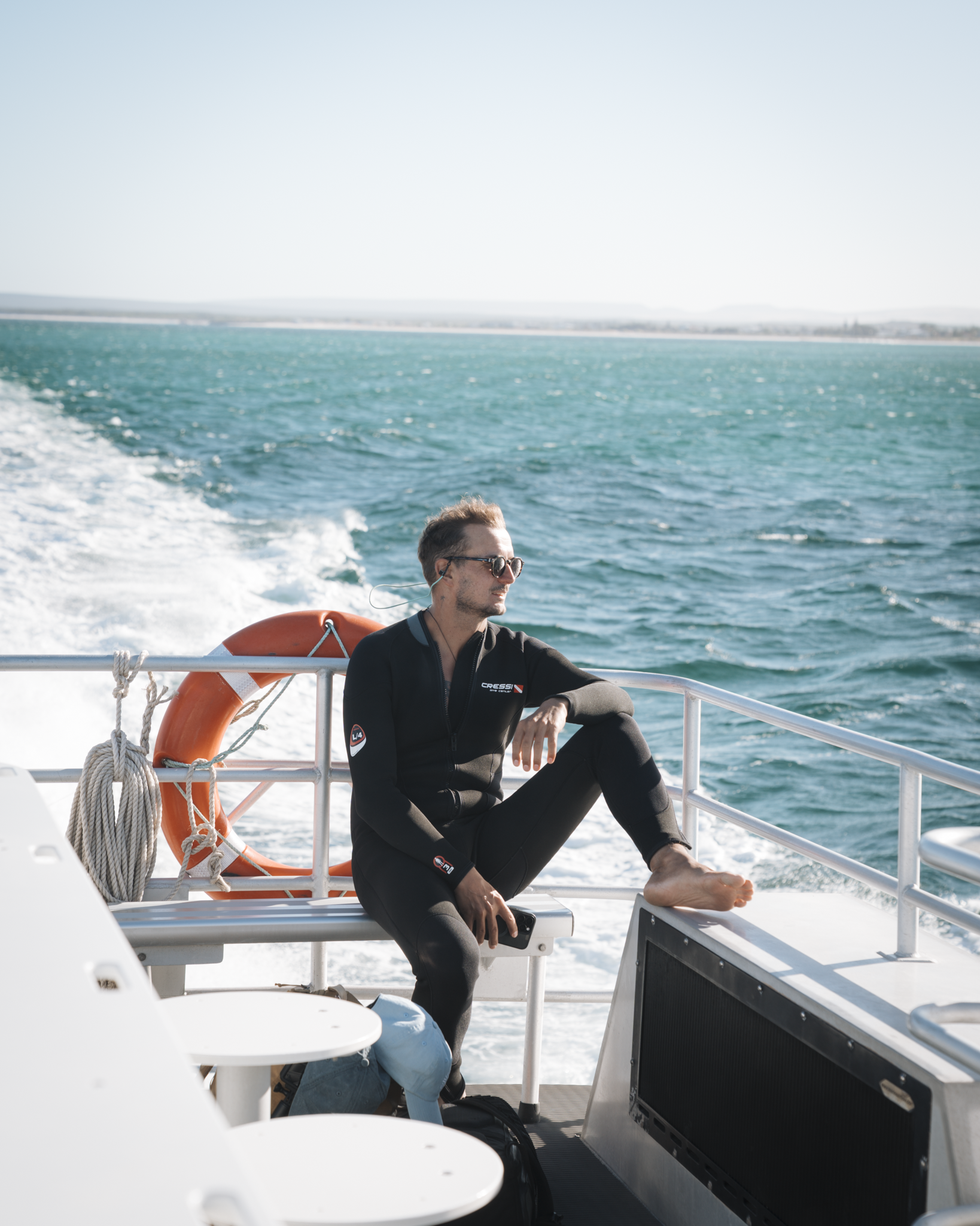 Guest enjoying a scenic boat cruise through the Jurien Bay Marine Park in Western Australia.