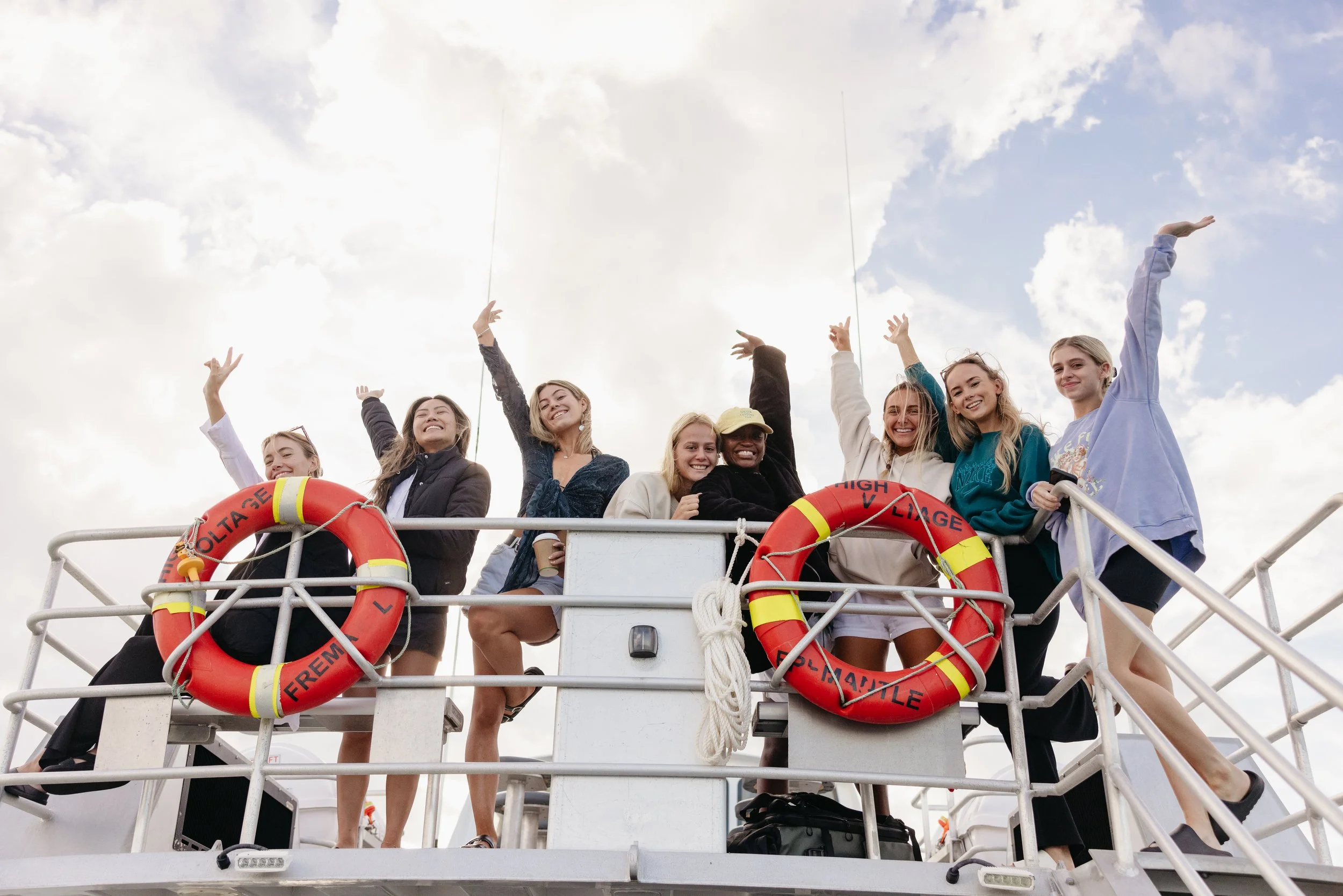 Guests enjoying the spacious upper deck aboard a Jurien Bay Oceanic Experience vessel in Jurien Bay, Western Australia.