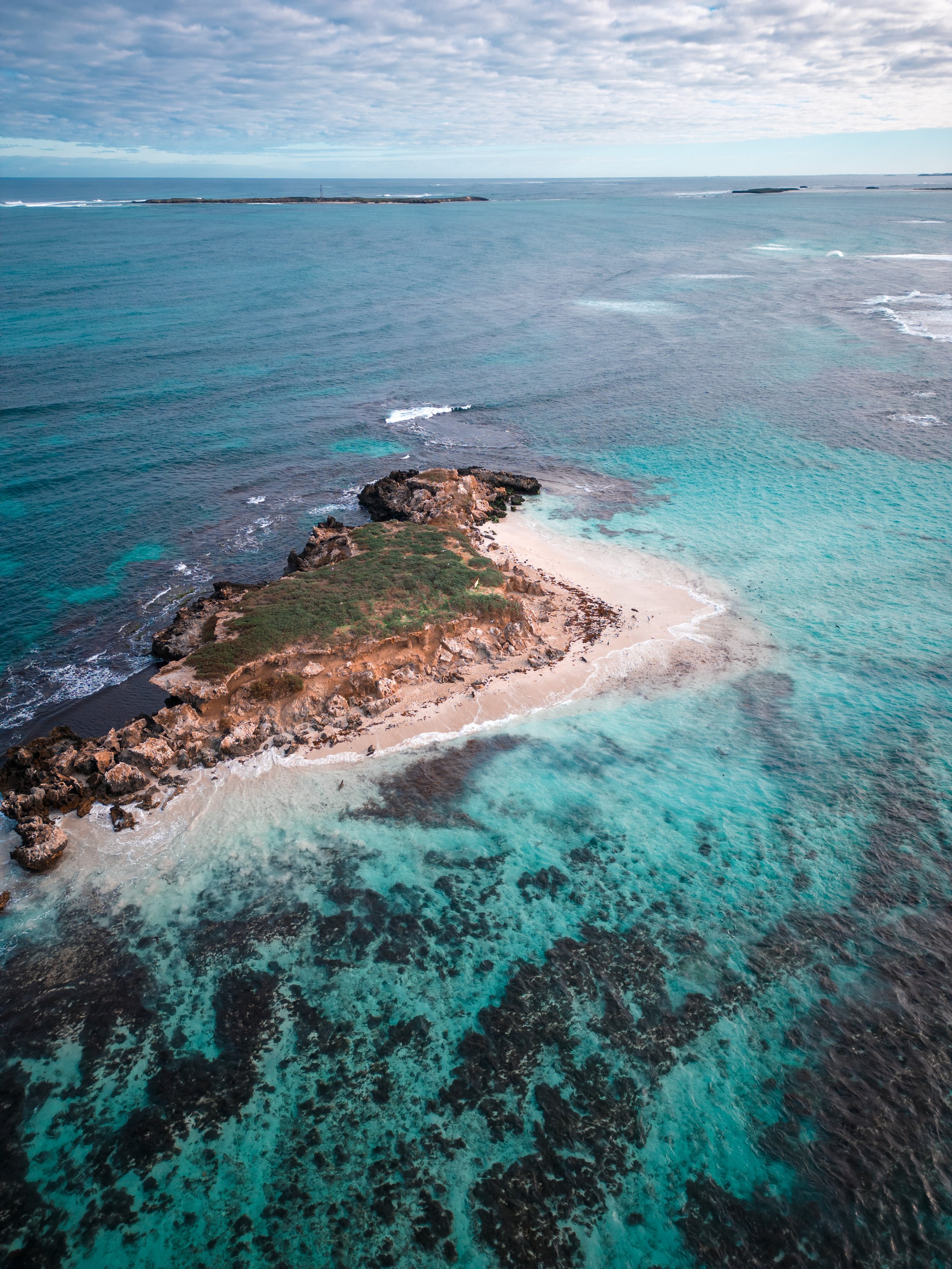 Aerial view of the turquoise waters and islands of the Jurien Bay Marine Park in Western Australia.