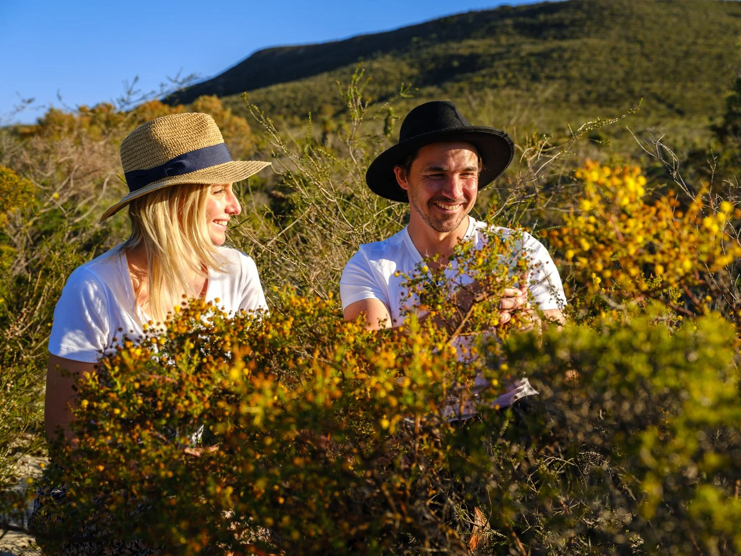 Visitors viewing spring wildflowers in Lesueur National Park near Jurien Bay.