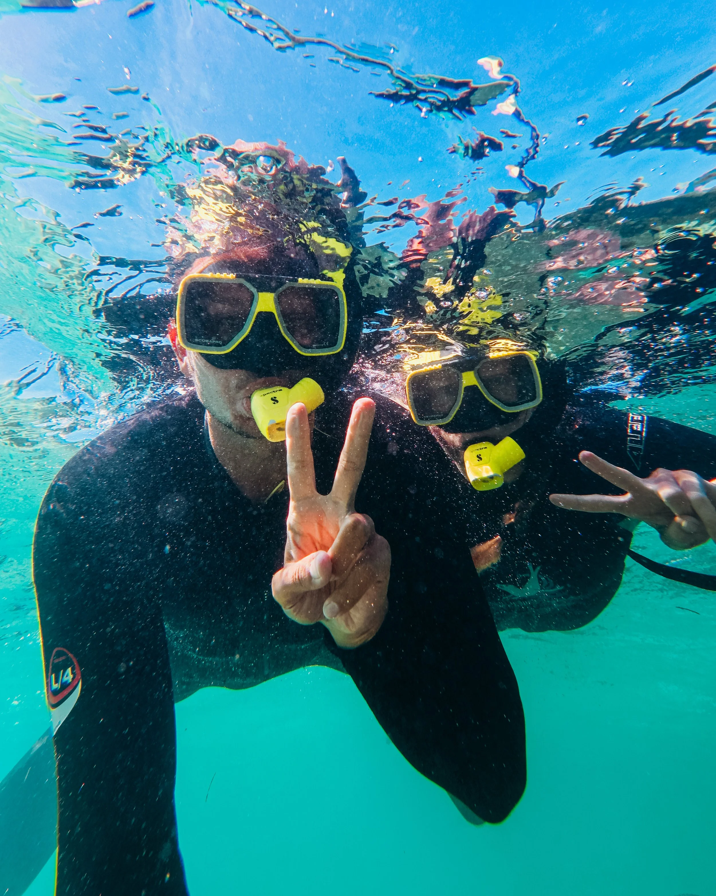 Guests geared up and snorkelling in the turquoise waters of the Jurien Bay Marine Park, Western Australia.