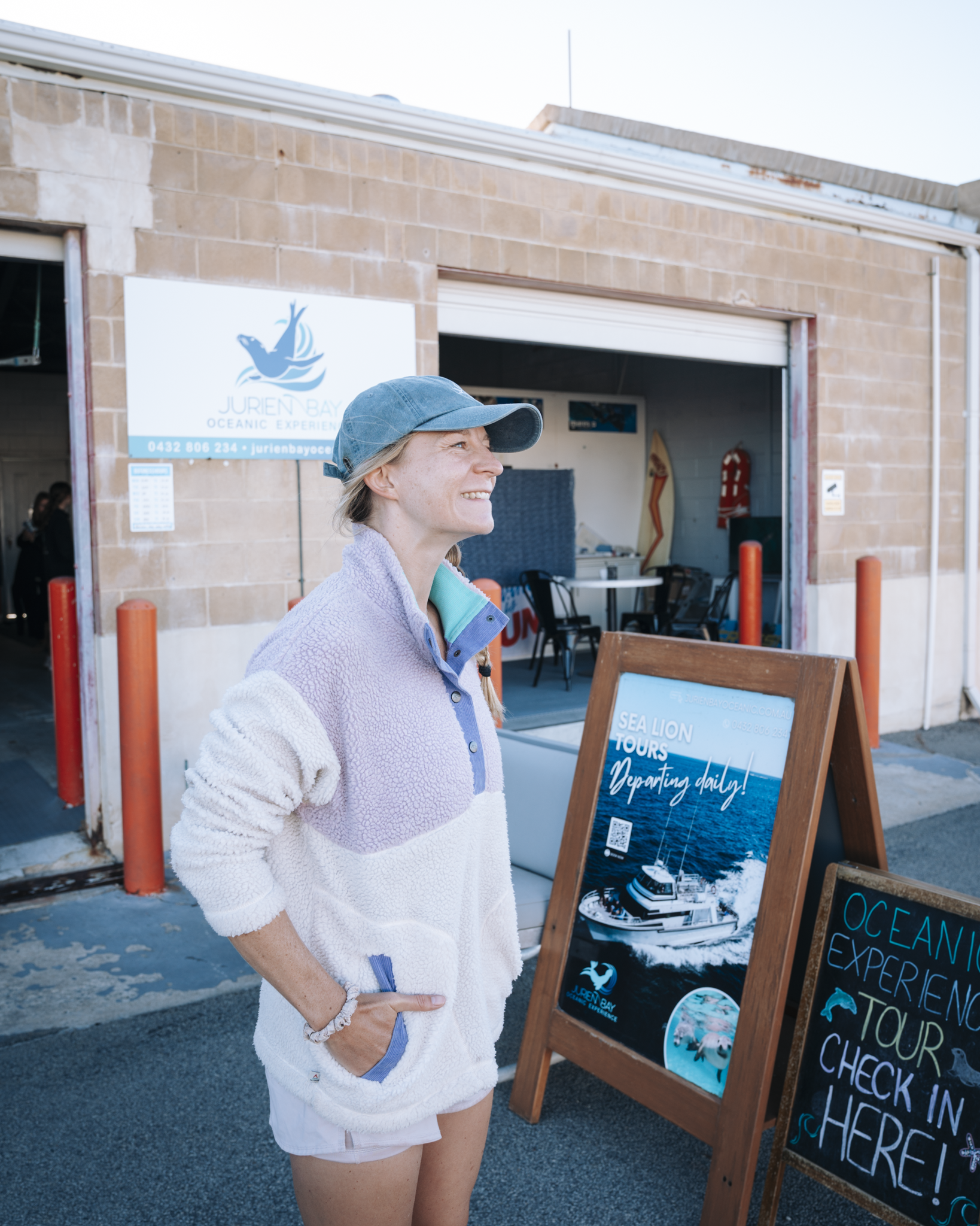 Guest checking in for a sea lion tour at  Jurien Bay Oceanic Experience in Jurien Bay, Western Australia