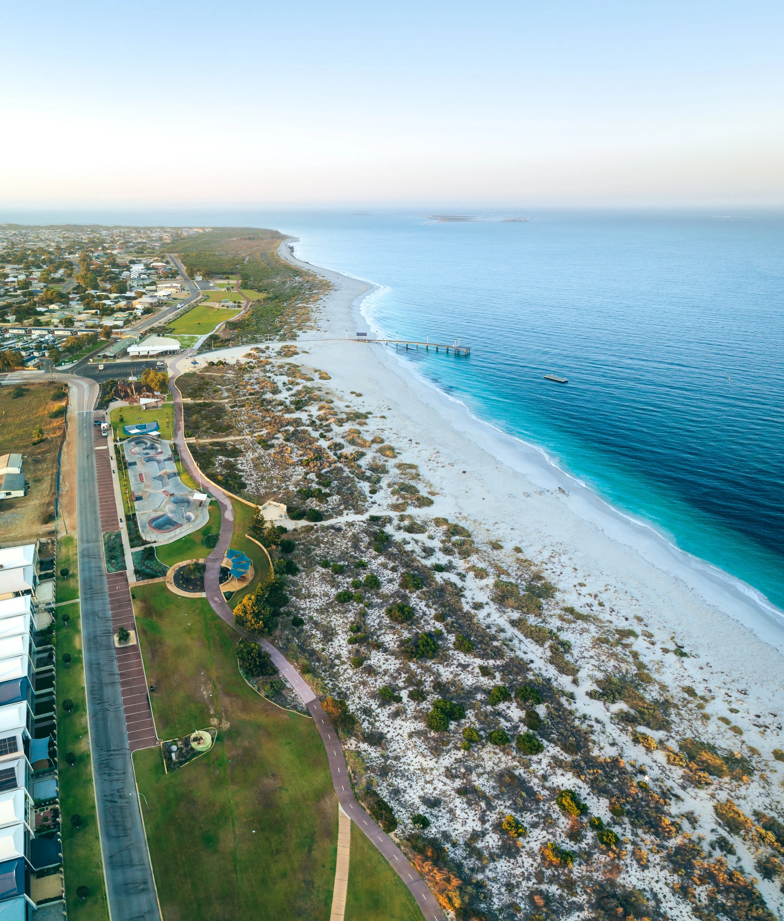 Aerial view of Jurien Bay town, foreshore, beach and jetty.