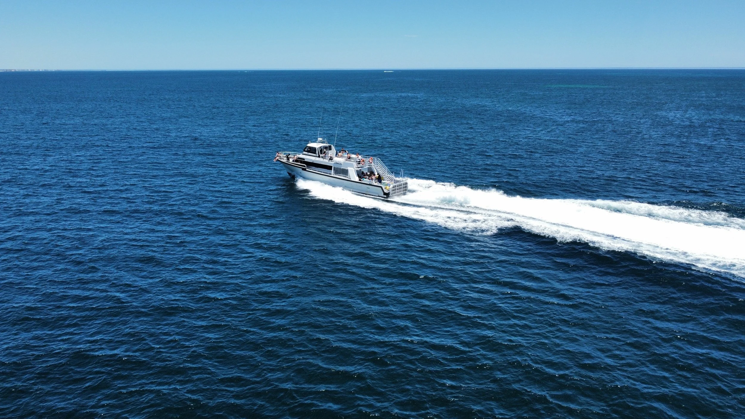 Jurien Bay Oceanic Experience tour vessel travelling through the Jurien Bay Marine Park.