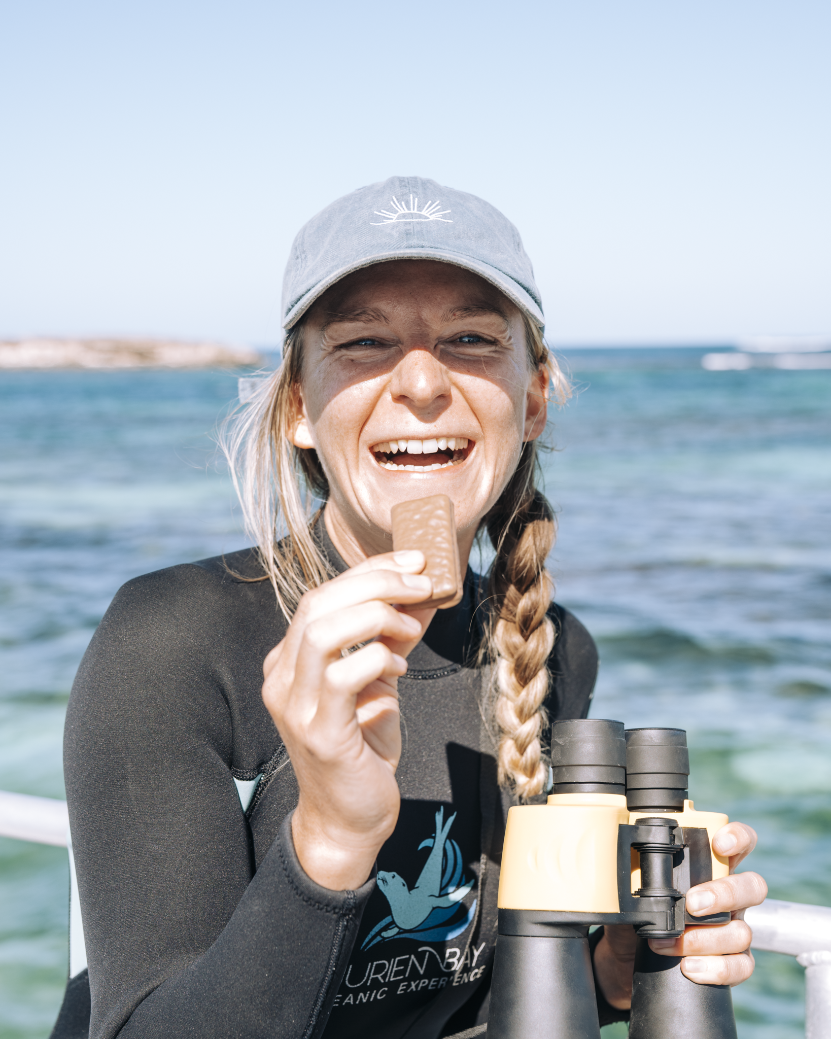 Guest smiling after an unforgettable Australian sea lion experience in Jurien Bay, Western Australia.