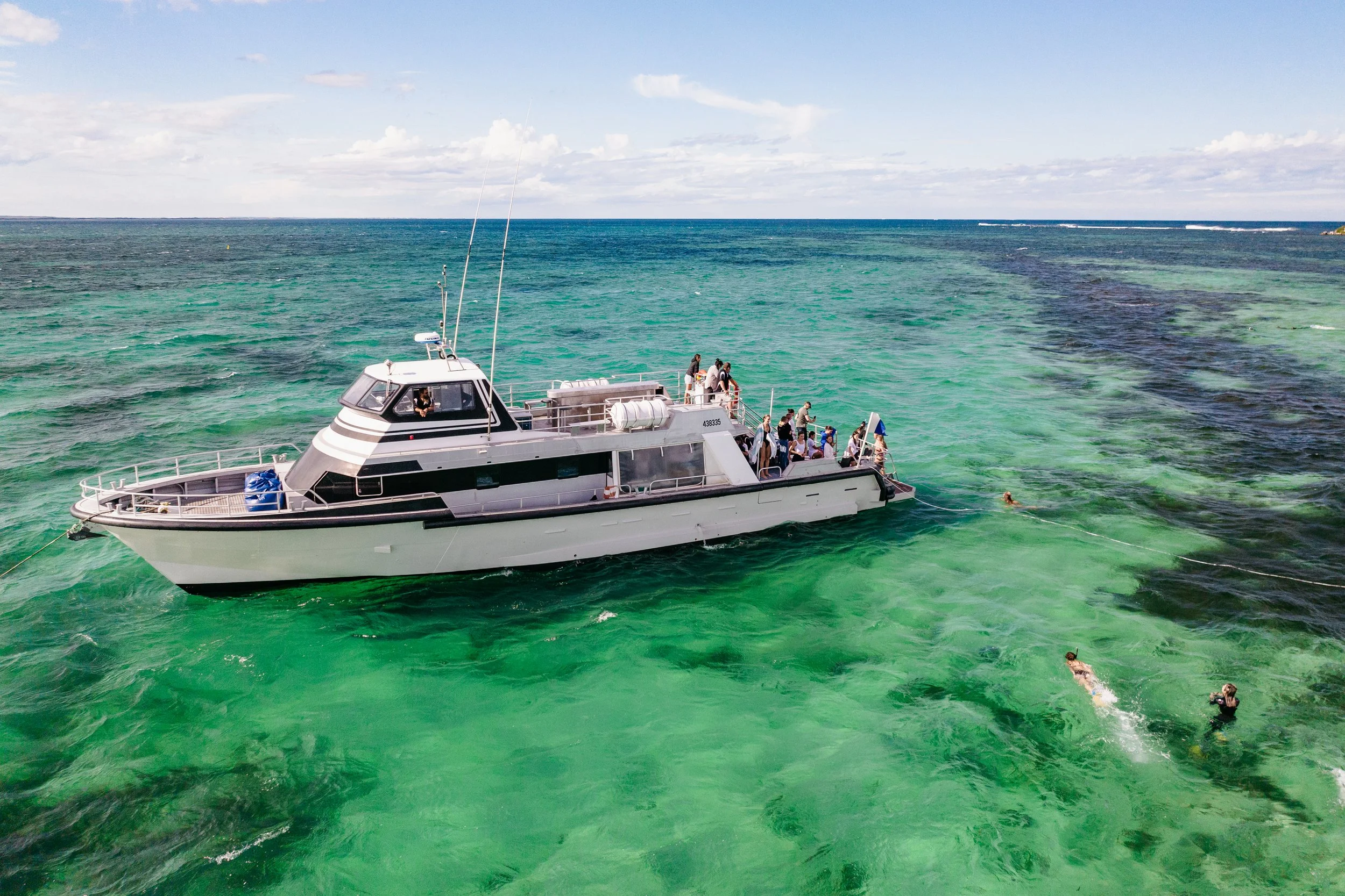 urien Bay Oceanic Experience vessel anchored in the turquoise waters of Jurien Bay, Western Australia.